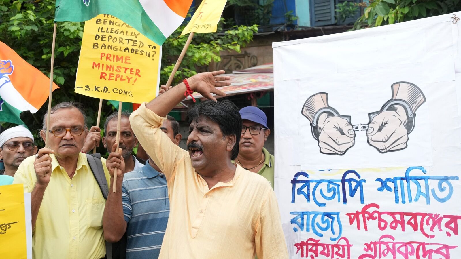 Congress workers raise slogans during a protest against the BJP-led central government over alleged detentions of Bengali-speaking migrant labourers in BJP-ruled states and their profiling as suspected Bangladeshis, in Kolkata, Tuesday, July 15, 2025.
