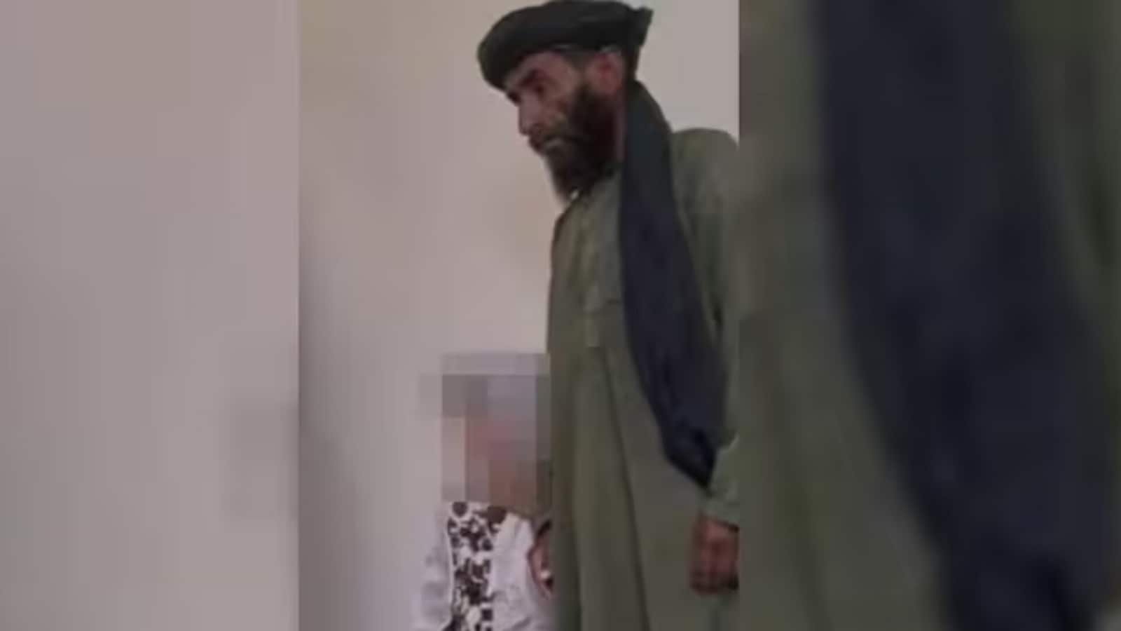 A photo from the marriage ceremony has sparked outrage (Image source: Amu TV screengrab)