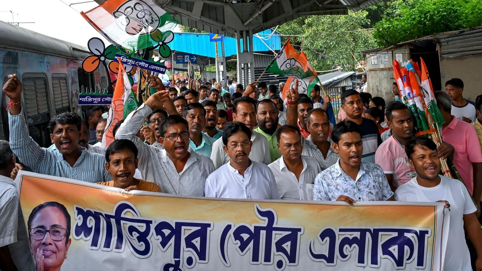 Nadia: TMC supporters raise slogans before boarding a Sealdah-bound train to attend the party's Martyrs� Day rally in Kolkata, in Nadia, West Bengal, Monday, July 21, 2025. (PTI Photo)