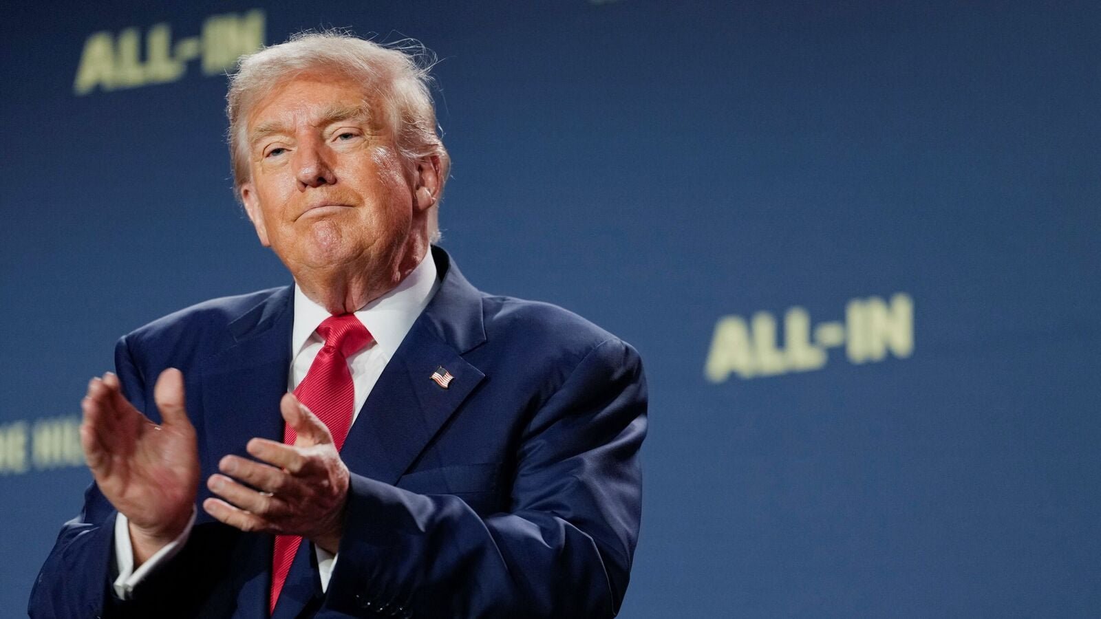 United States President Donald Trump applauds at the Winning the AI Race Summit in Washington DC on July 23, 2025. He has signed an executive order dubbed as America's 'AI Action Plan' focused on boosting the tech in the US.