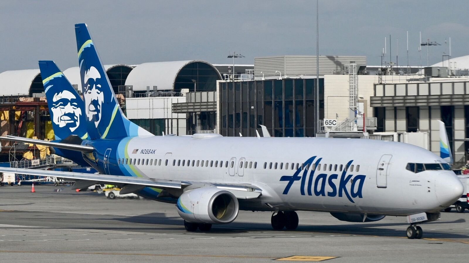 An Alaska airlines plane seen at Los Angeles International Airport (LAX) on January 11, 2023. (Photo by Daniel SLIM / AFP)