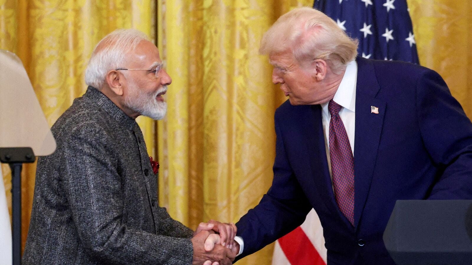 FILE PHOTO: US President Donald Trump and Prime Minister Narendra Modi shake hands as they attend a joint press conference at the White House in Washington, DC, US, on February 13, 2025.