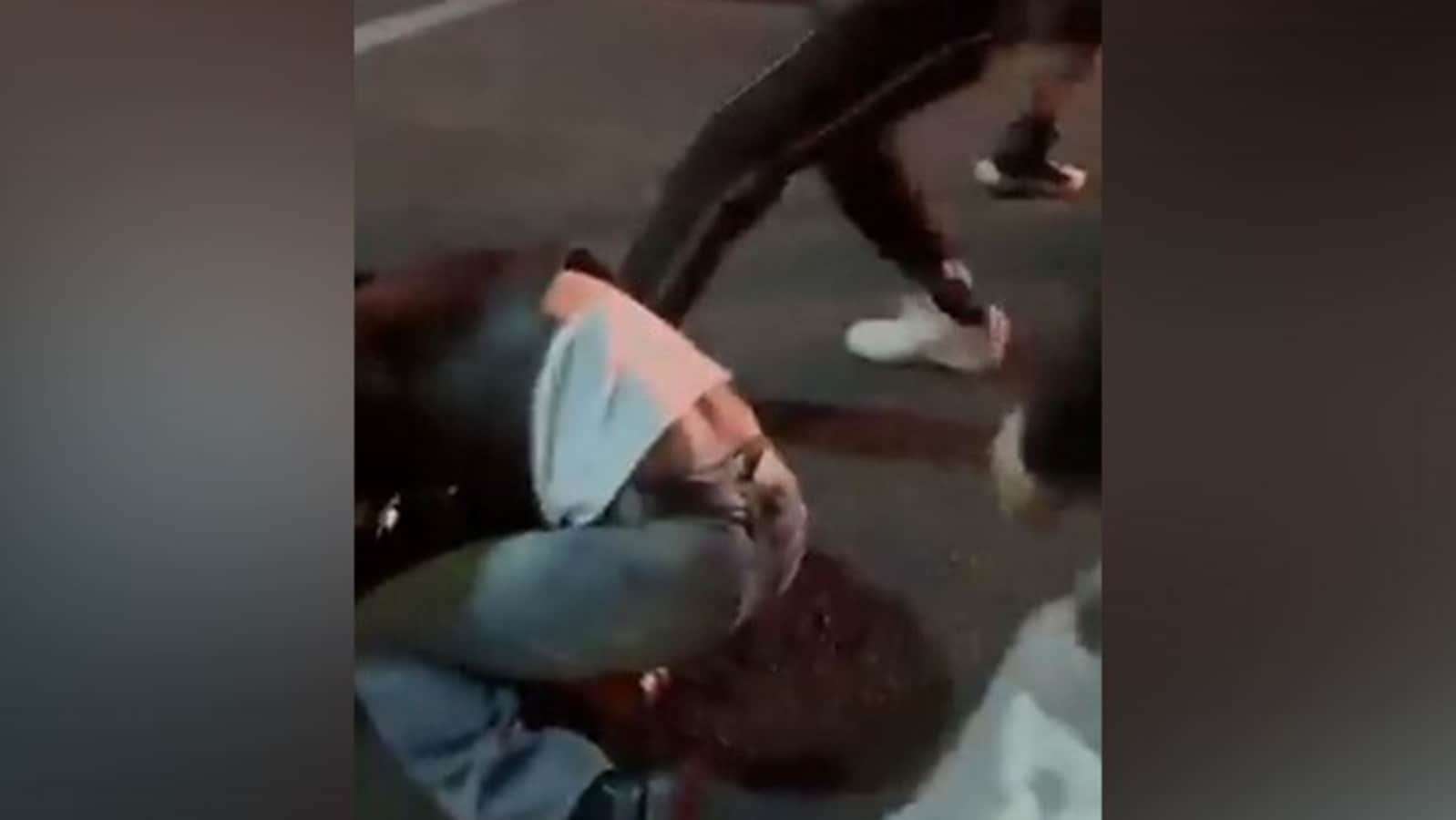 A 23-year-old Indian man, Charanpreet Singh, was brutally assaulted and left unconscious on a street in Adelaide after a group of men allegedly hurled racist abuse and attacked him over a car parking dispute