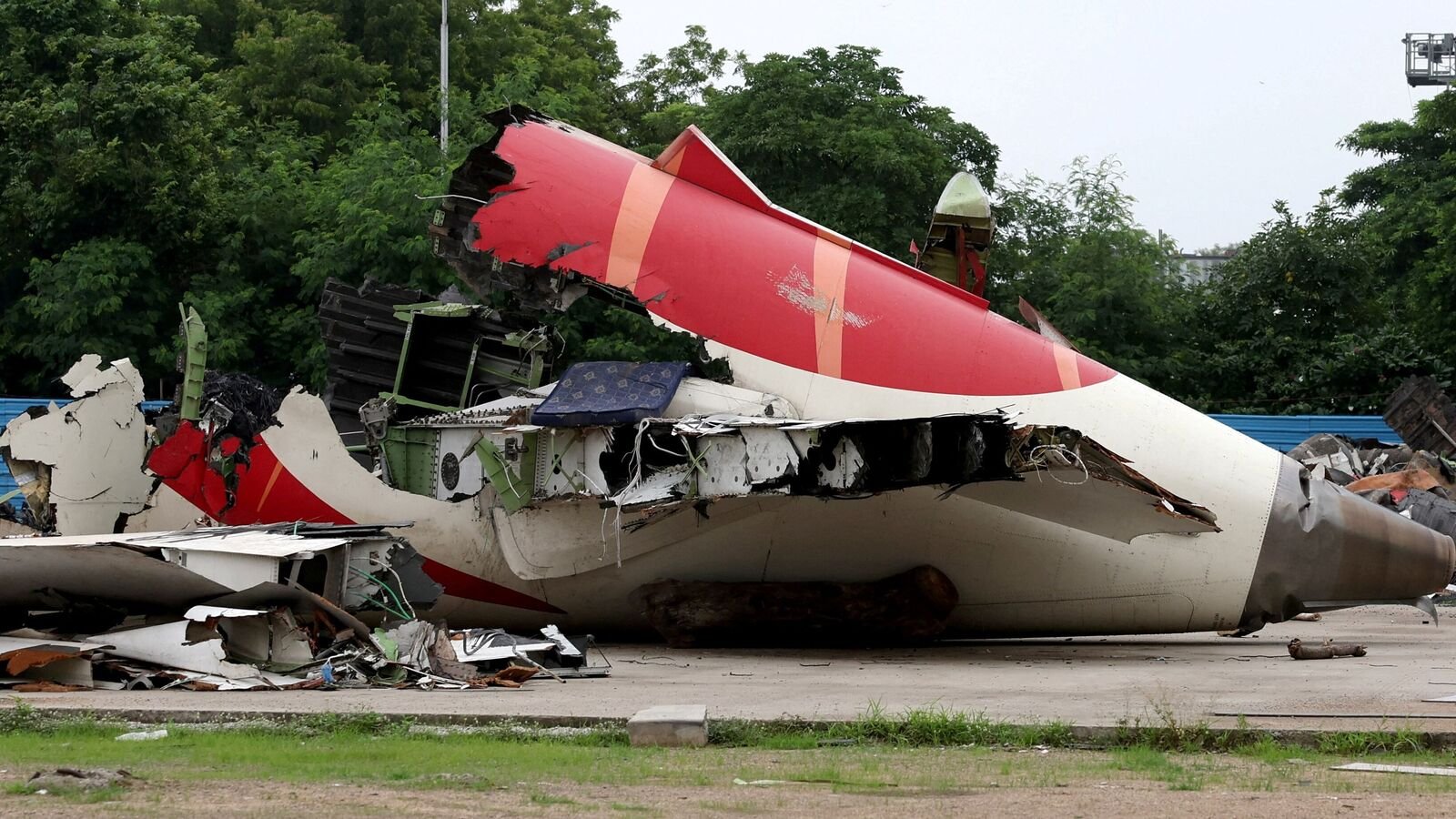 FILE PHOTO: Wreckage of the Air India Boeing 787-8 Dreamliner plane sits on the open ground, outside Sardar Vallabhbhai Patel International Airport, where it took off and crashed nearby shortly afterwards, in Ahmedabad, India July 12, 2025. REUTERS/Amit Dave/File Photo