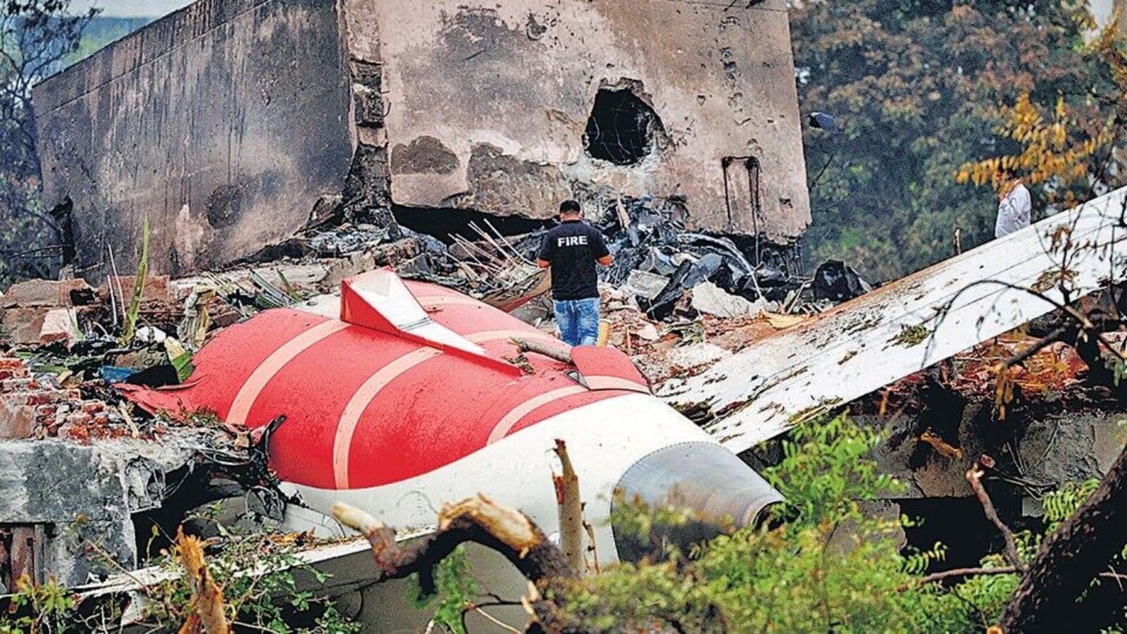 A firefighter stands next to the crashed Air India Boeing 787-8 Dreamliner aircraft, in Ahmedabad, India, on June 13, 2025.