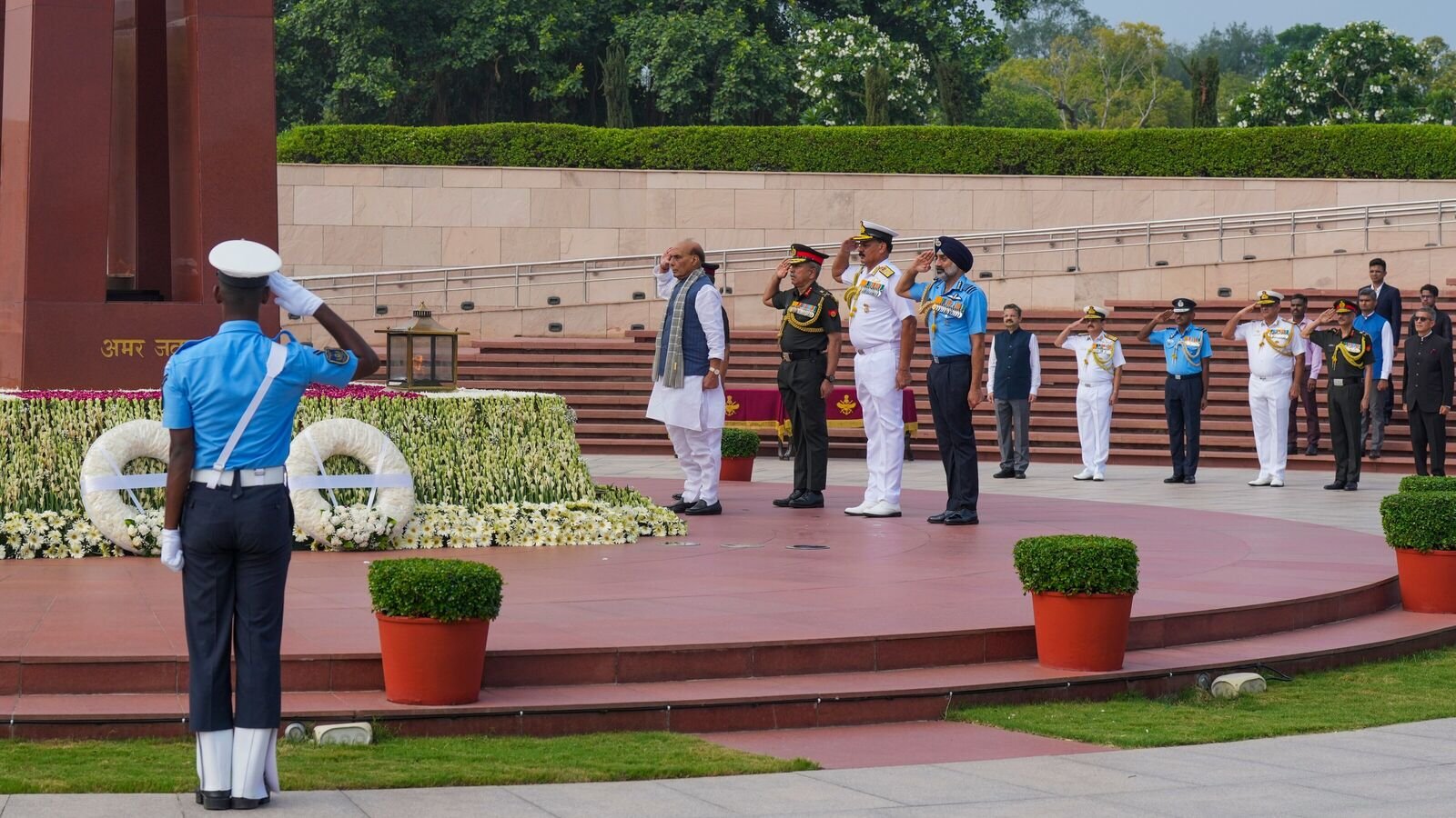 Defence Minister Rajnath Singh, Vice Chief of the Army Staff Lt. General NS Raja Subramani, Chief of the Naval Staff Admiral Dinesh K Tripathi, and Chief of the Air Staff Air Chief Marshal AP Singh, pay tribute to the Kargil War martyrs at the National War Memorial, on the 26th anniversary of the 'Kargil Vijay Diwas', in New Delhi on Saturday, July 26, 2025.