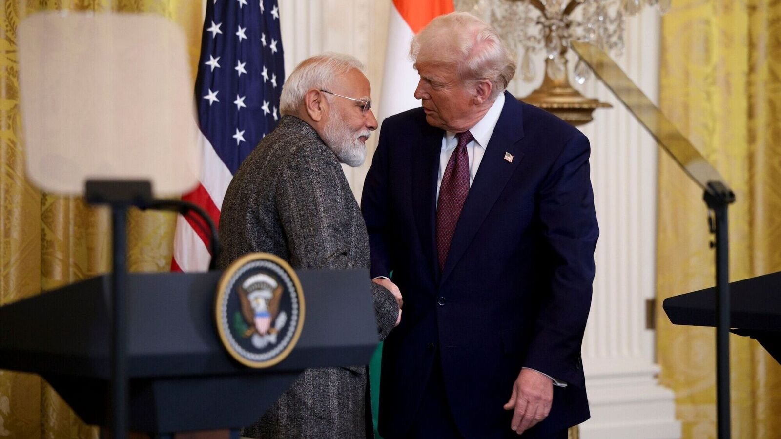 US President Donald Trump, right, and Narendra Modi, India's prime minister, shake hands during a news conference in the East Room of the White House in Washington, DC, US.