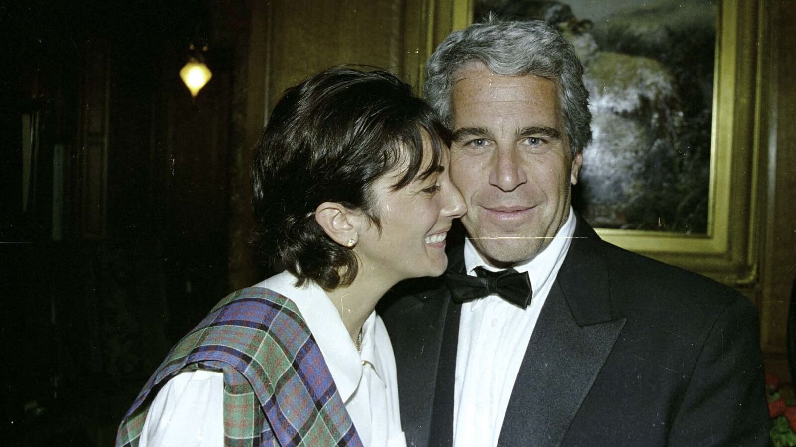 This undated trial evidence image obtained December 8, 2021, from the US District Court for the Southern District of New York shows British socialite Ghislaine Maxwell and US financier Jeffrey Epstein. (Photo by Handout / US District Court for the Southern District of New York / AFP)