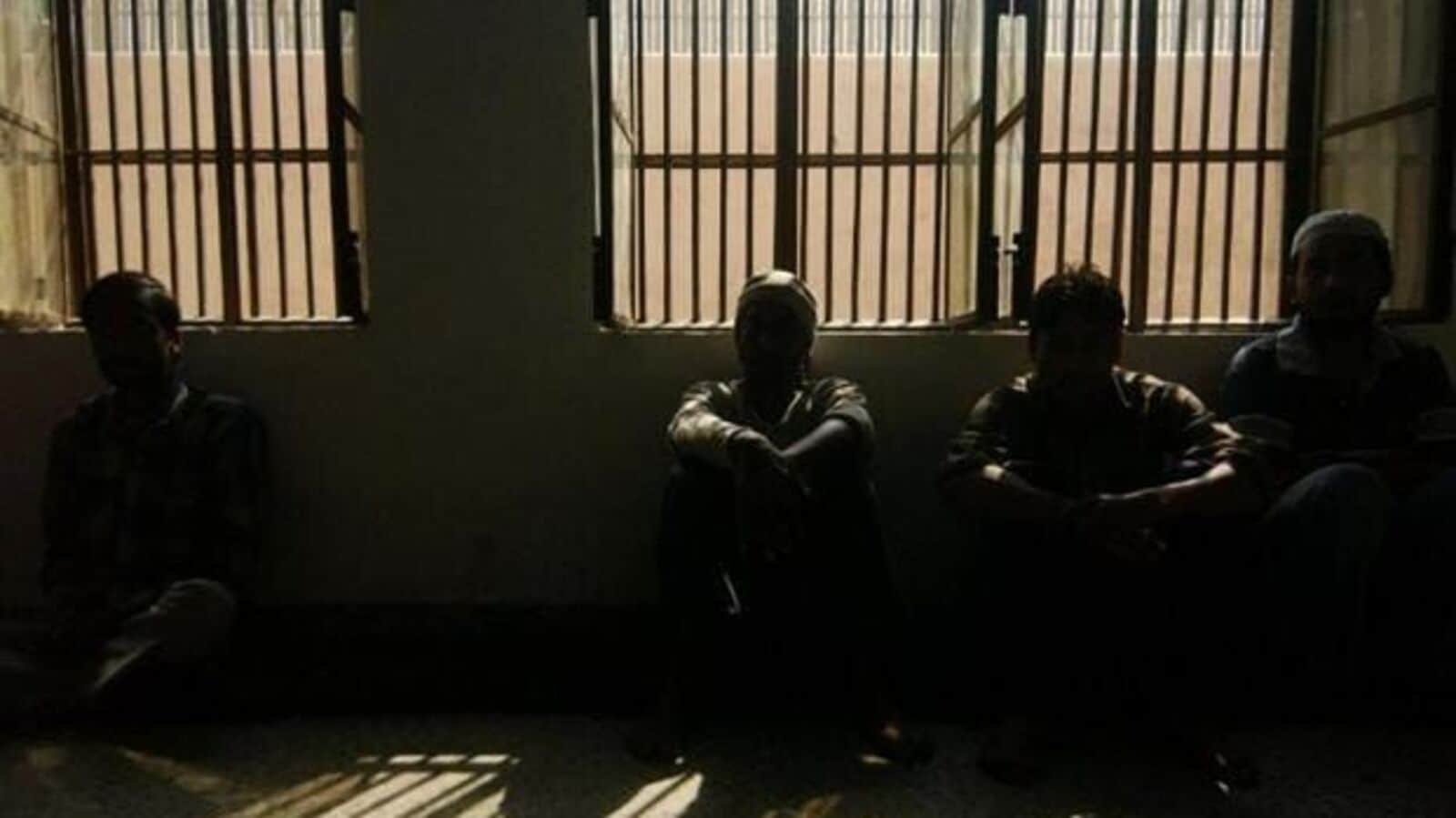 A file photo of Indian prisoners sitting in a cell of Tihar Jail in New Delhi. Photo: Manpreet Romana/AFP. (Photo: Representative)