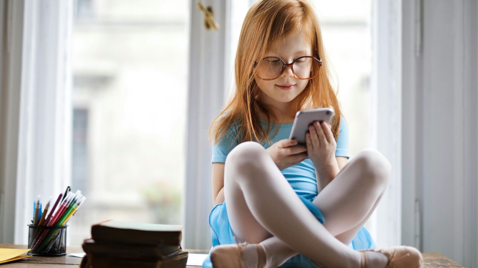 To protect children’s mental health, experts urge restrictions on smartphone and social media use for those under 13.