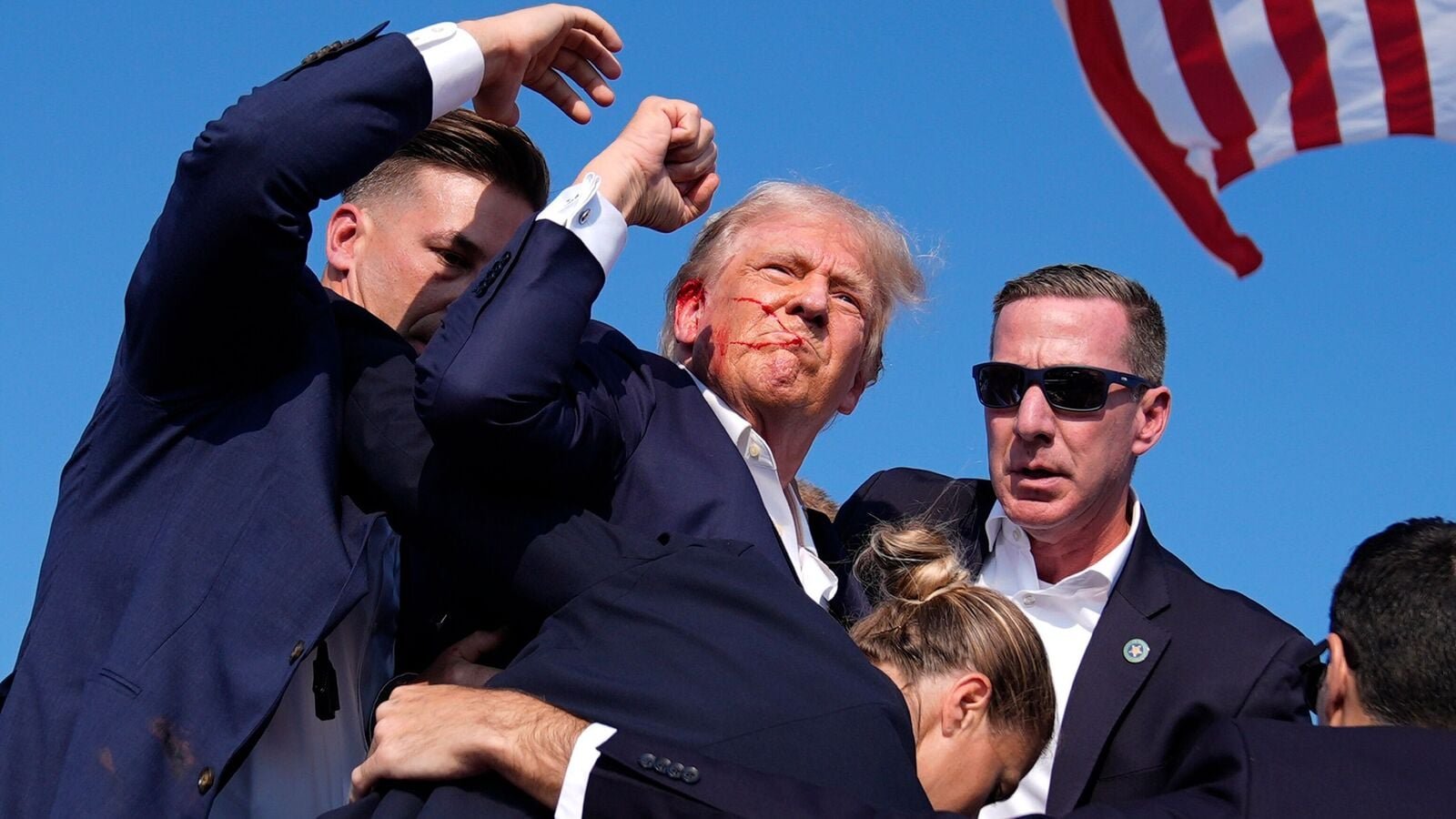 FILE - Republican presidential candidate former President Donald Trump is surrounded by U.S. Secret Service agents at a campaign rally, July 13, 2024, in Butler, Pa. (AP Photo/Evan Vucci, File)
