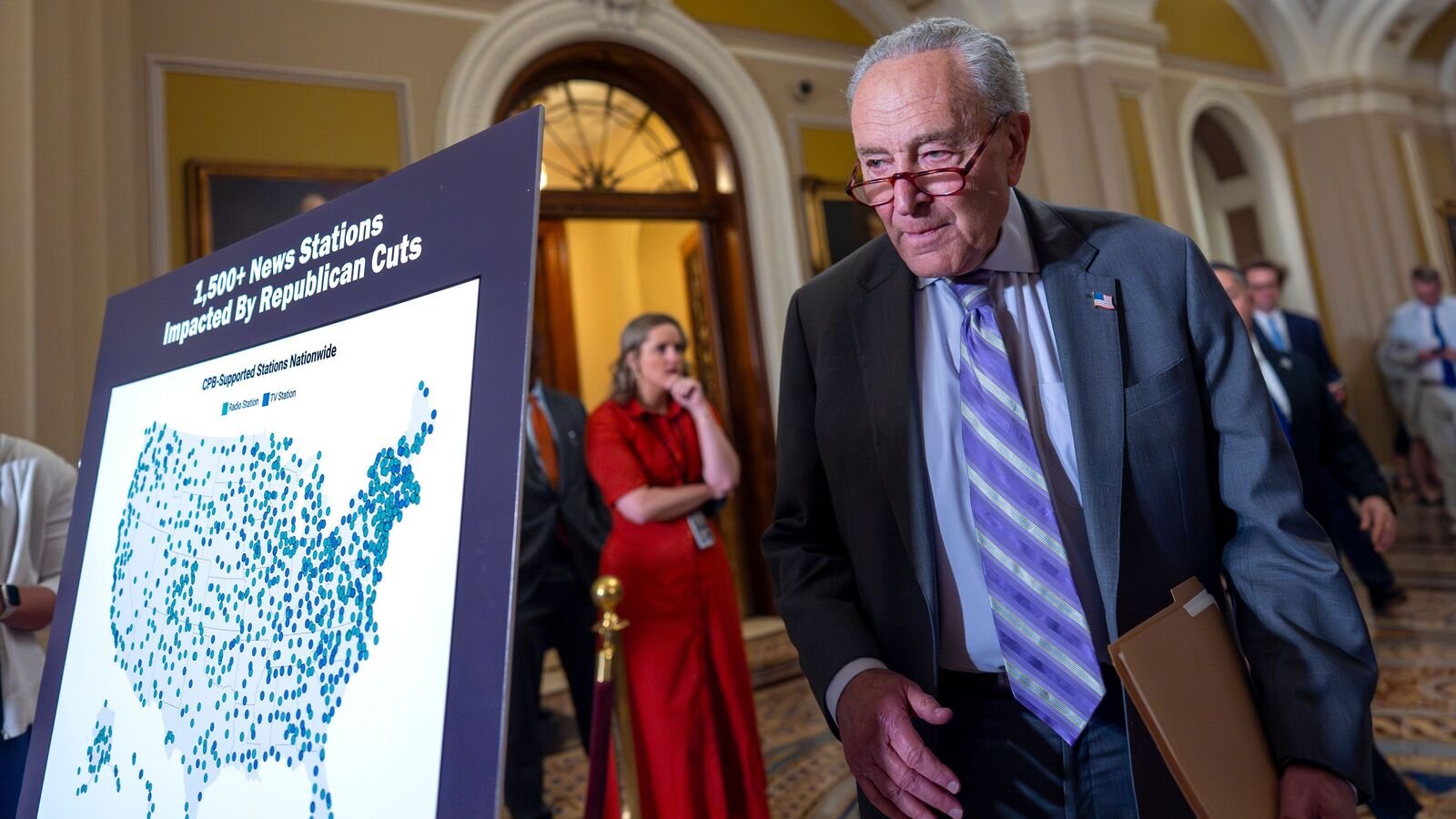 Senate Minority Leader Chuck Schumer, D-N.Y., arrives to speak with reporters about Senate Republicans' efforts to claw back $1.1 billion of funding authority from the Corporation for Public Broadcasting and about $8.3 billion from foreign aid programs targeted by DOGE, at the Capitol in Washington, Tuesday, July 15, 2025. (AP Photo/J. Scott Applewhite)
