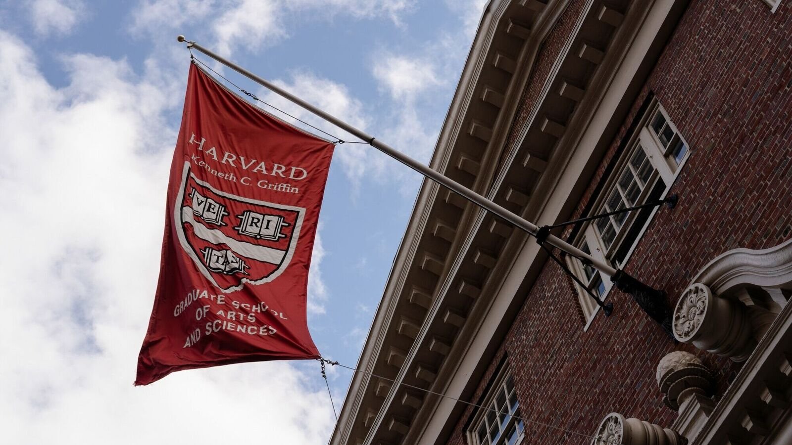 Harvard University said that a combined cost of federal actions against the institution could reach $1 billion annually, leading to hiring freeze and cost cuts.