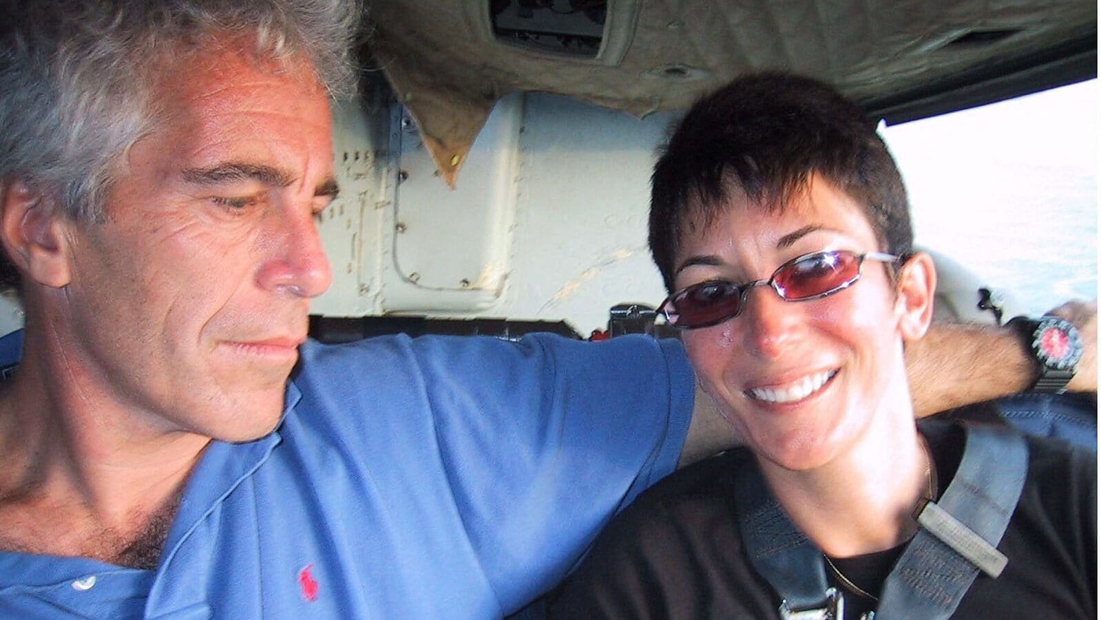 This undated trial evidence image obtained December 8, 2021, from the US District Court for the Southern District of New York shows British socialite Ghislaine Maxwell (R) and US financier Jeffrey Epstein (L). (Photo by Handout / US District Court for the Southern District of New York / AFP)