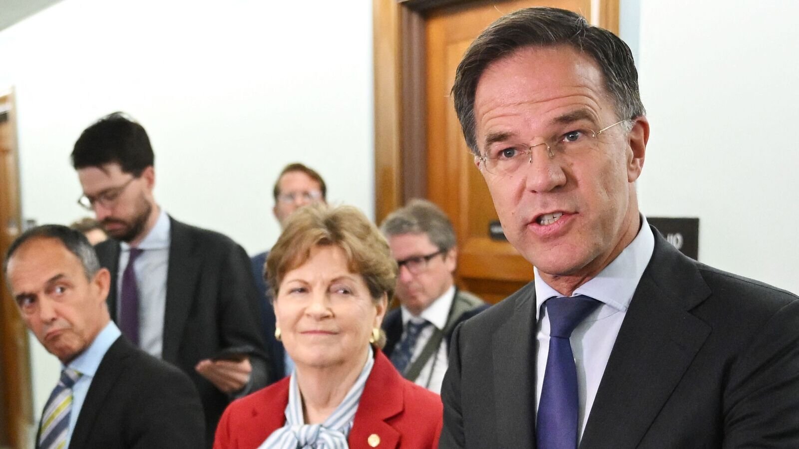 NATO Secretary General Mark Rutte holds a press conference with US Senators Thom Tillis, Republican from North Carolina (out of photo), and Jeanne Shaheen (L), Democrat from New Hampshire, on Capitol Hill in Washington, DC. Tillis and Shaheen are the co-chairs of the Senate NATO Observer Group