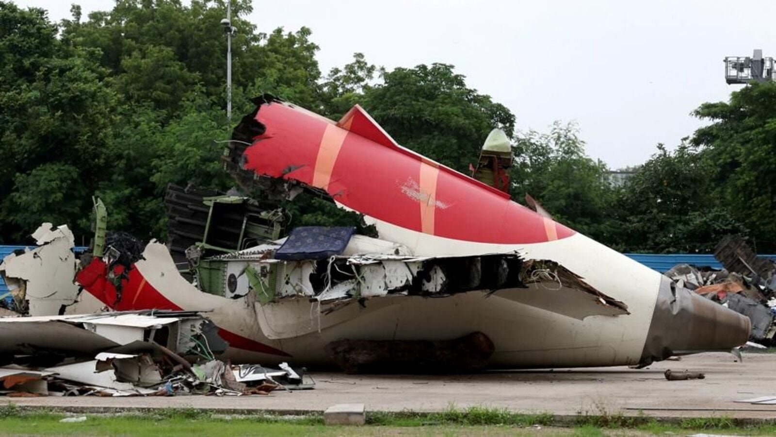Wreckage of the Air India Boeing 787-8 Dreamliner plane sits on the open ground, outside Sardar Vallabhbhai Patel International Airport, where it took off and crashed nearby shortly afterwards, in Ahmedabad, India on July 12, 2025.