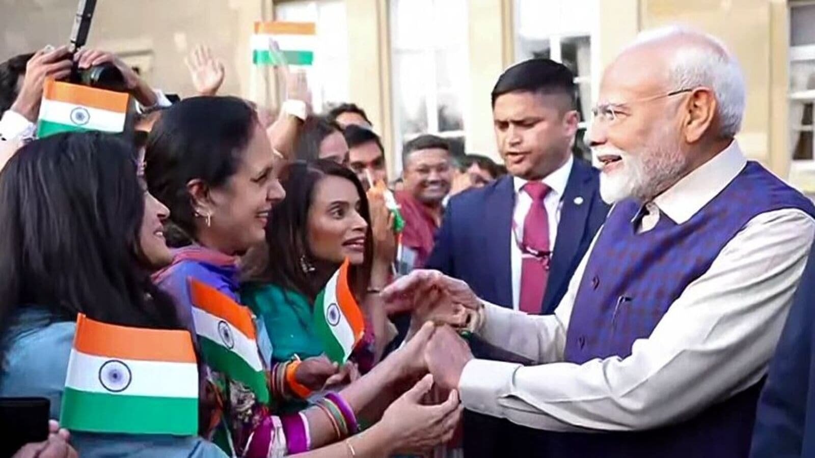 Prime Minister Narendra Modi receives a warm welcome from the members of the Indian Diaspora, in London on Wednesday.