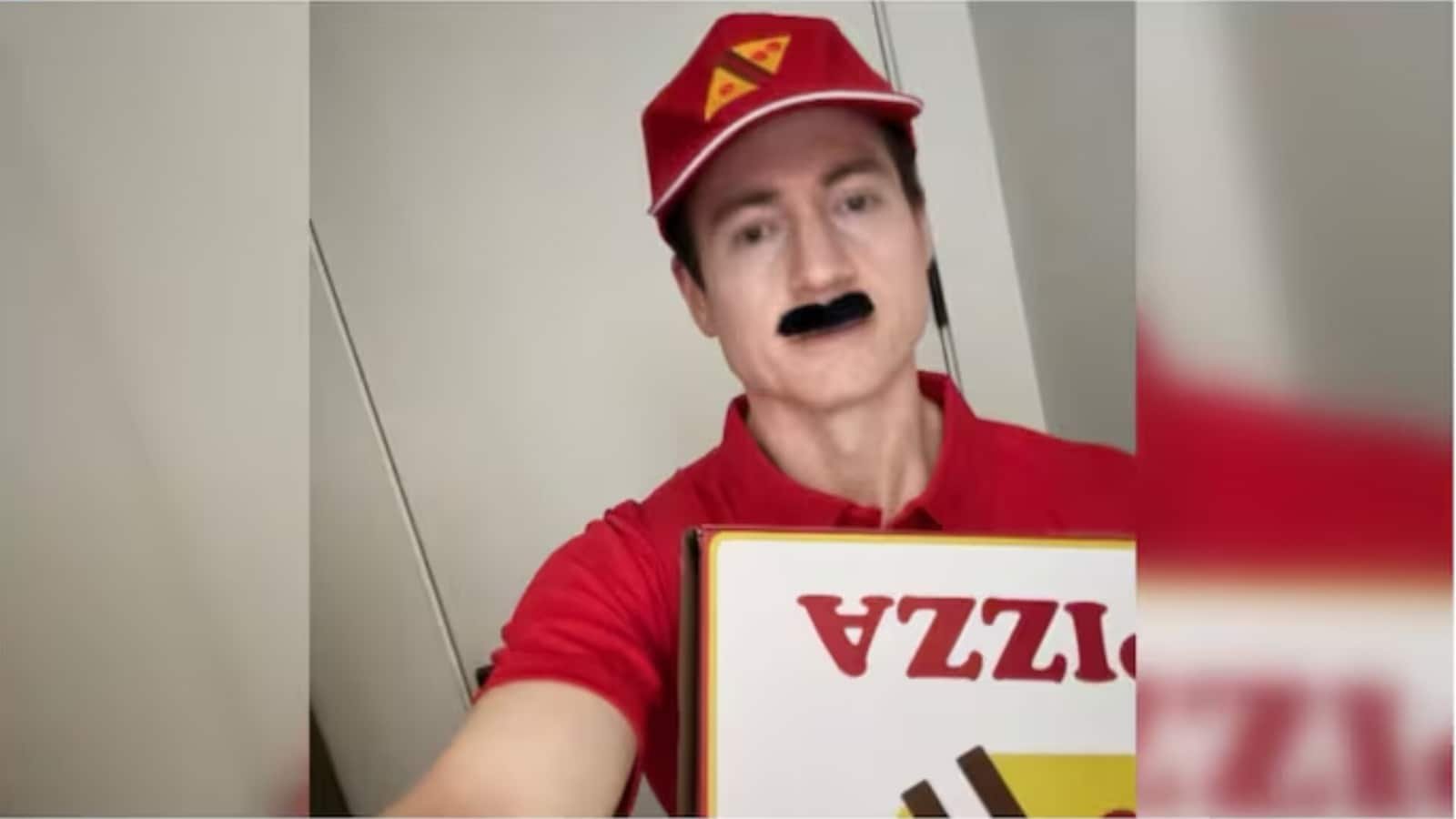 Bryan Johnson suits up as pizza delivery boy.
