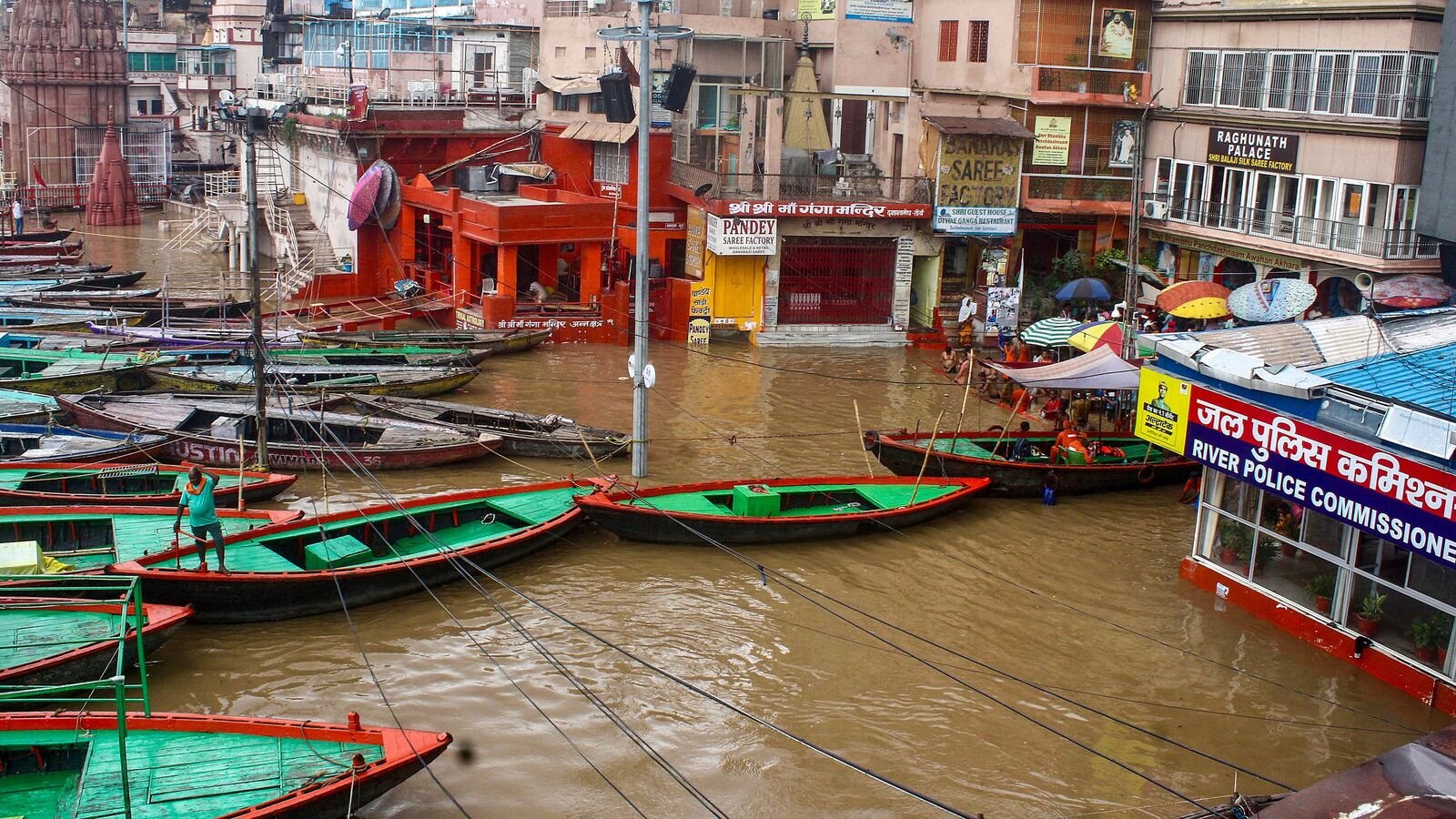 Varanasi: Boats anchored at the submerged Dashashwamedh Ghat as the Ganga river continues to rise during the monsoon season, in Varanasi, Wednesday, July 16, 2025.