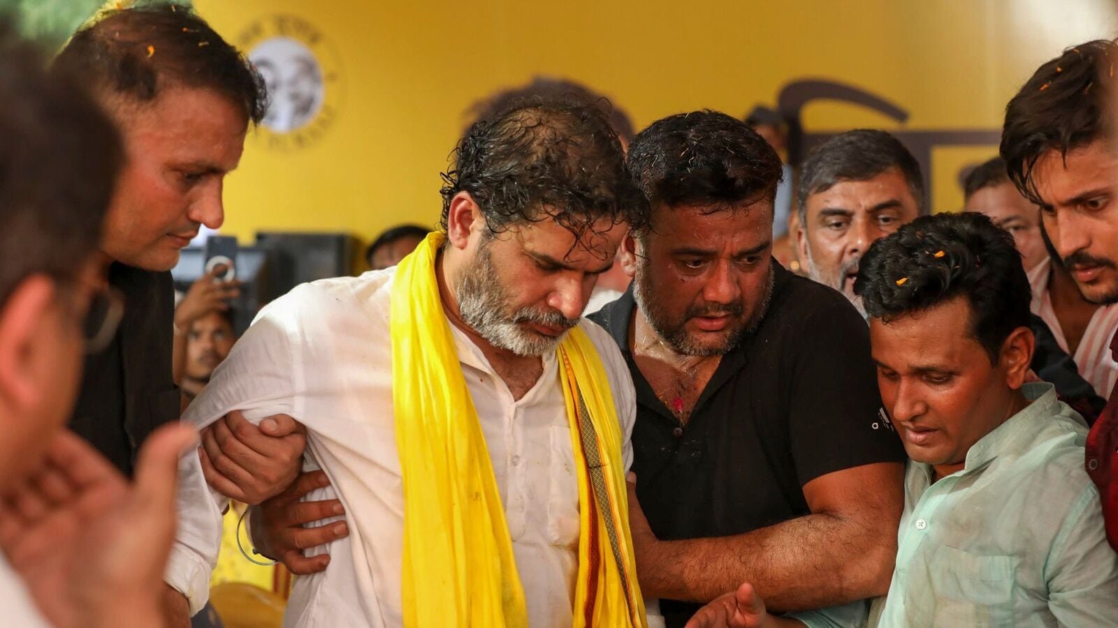 Jan Suraaj chief Prashant Kishor being assisted after an injury during the 'Bihar Badlav' rally, in Arrah, Friday, July 18, 2025. (PTI Photo)