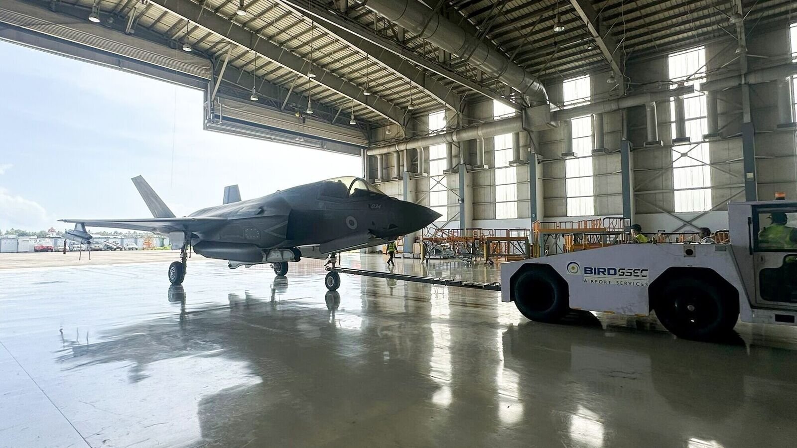 UK F35B aircraft moved to hangar, following an emergency landing on June 14, in Thiruvananthapuram. (UK Defence in India X/ANI Photo)