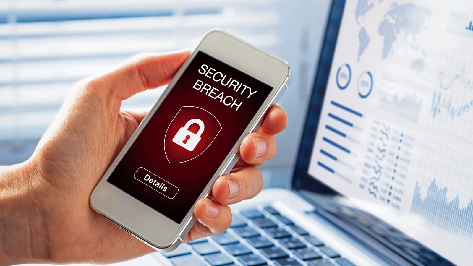 Security breach warning on smartphone screen, device infected by internet virus or malware after cyberattack by hacker, fraud alert with red padlock icon