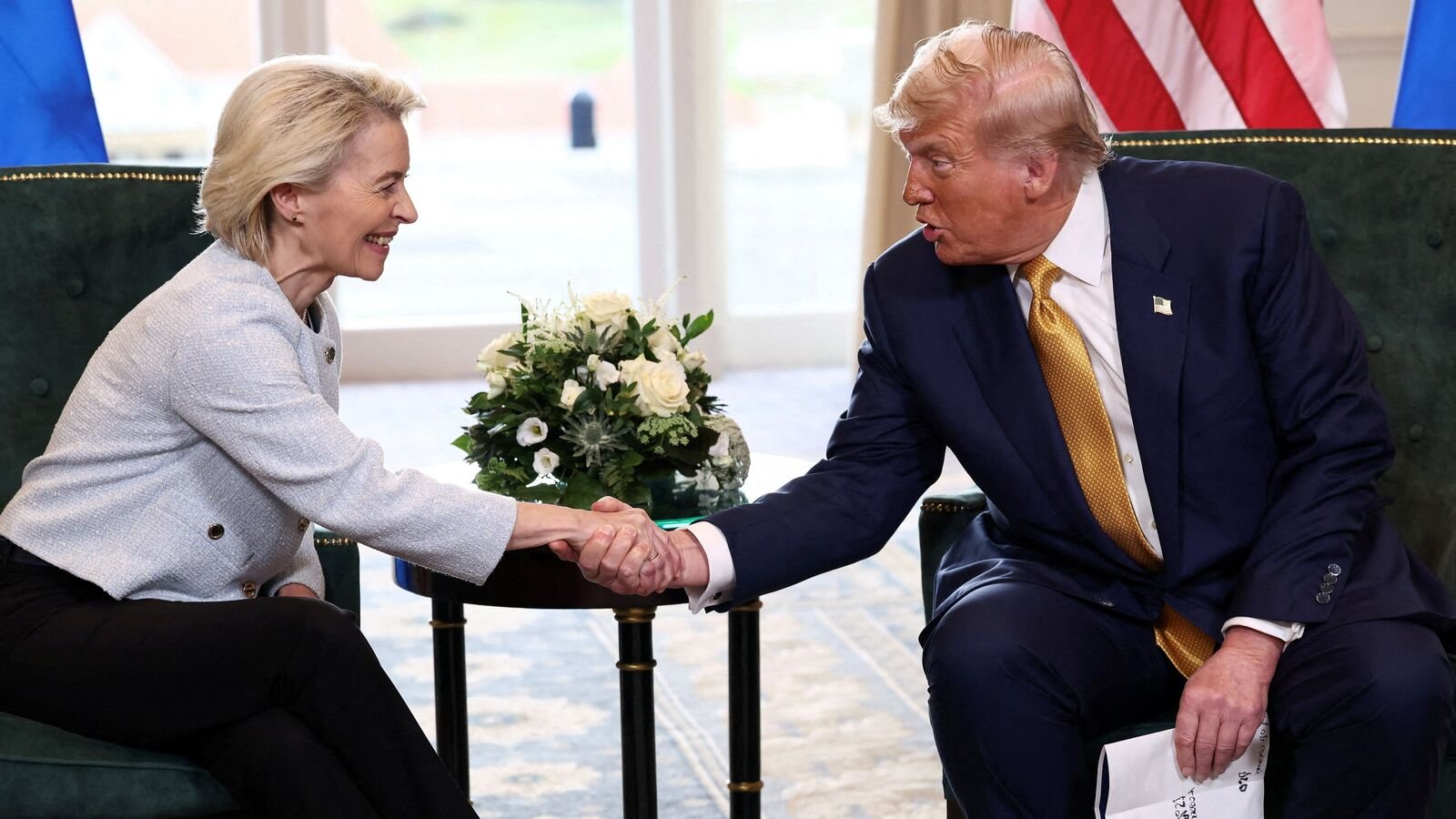 U.S. President Donald Trump shakes hands with European Commission President Ursula von der Leyen, after an announcement of a trade deal between the U.S. and EU, in Turnberry, Scotland, Britain, July 27, 2025. REUTERS/Evelyn Hockstein     TPX IMAGES OF THE DAY