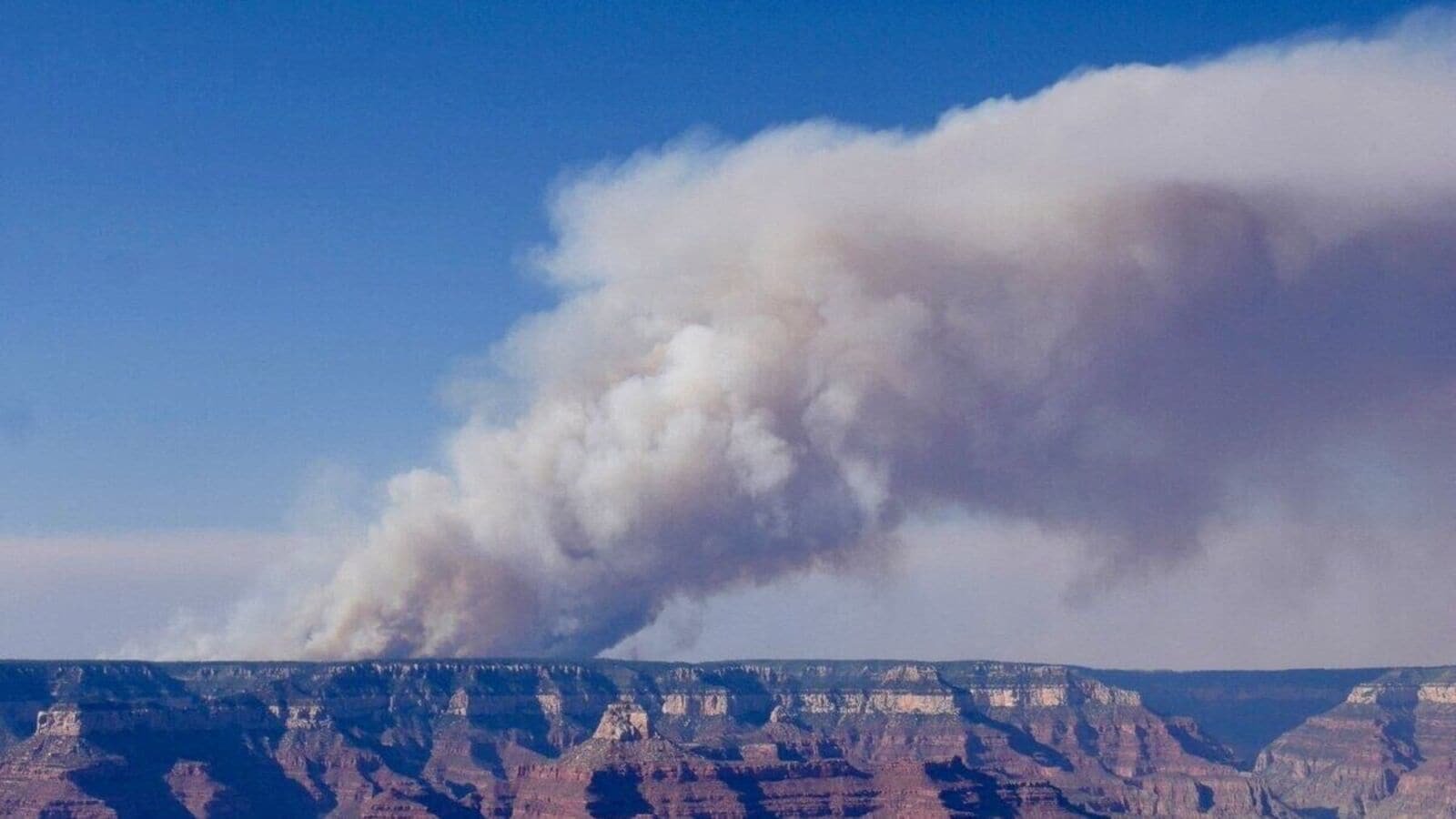 Smoke billows over the Grand Canyon, Arizona, U.S., in this image released on July 11, 2025, obtained from social media. NPS Photo/M. Quinn via REUTERS  THIS IMAGE HAS BEEN SUPPLIED BY A THIRD PARTY. MANDATORY CREDIT. NO RESALES. NO ARCHIVES.