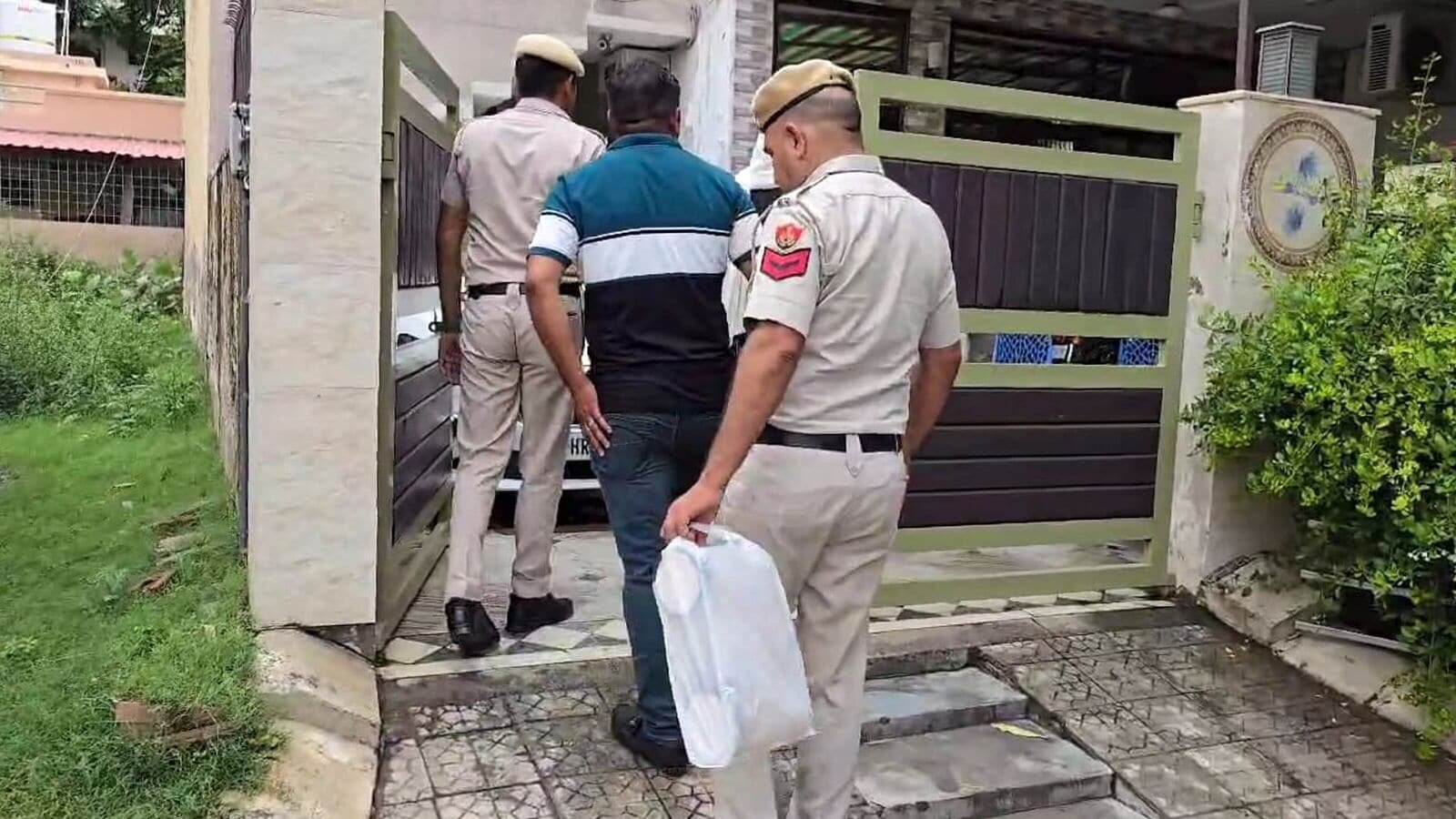 Gurugram: Police personnel and others during an investigation at the residence of Radhika Yadav, 25-year-old former state-level tennis player who was allegedly shot dead by her father at the family's double-storey home at Sushant Lok area, in Gurugram, Haryana, Thursday, July 10, 2025.