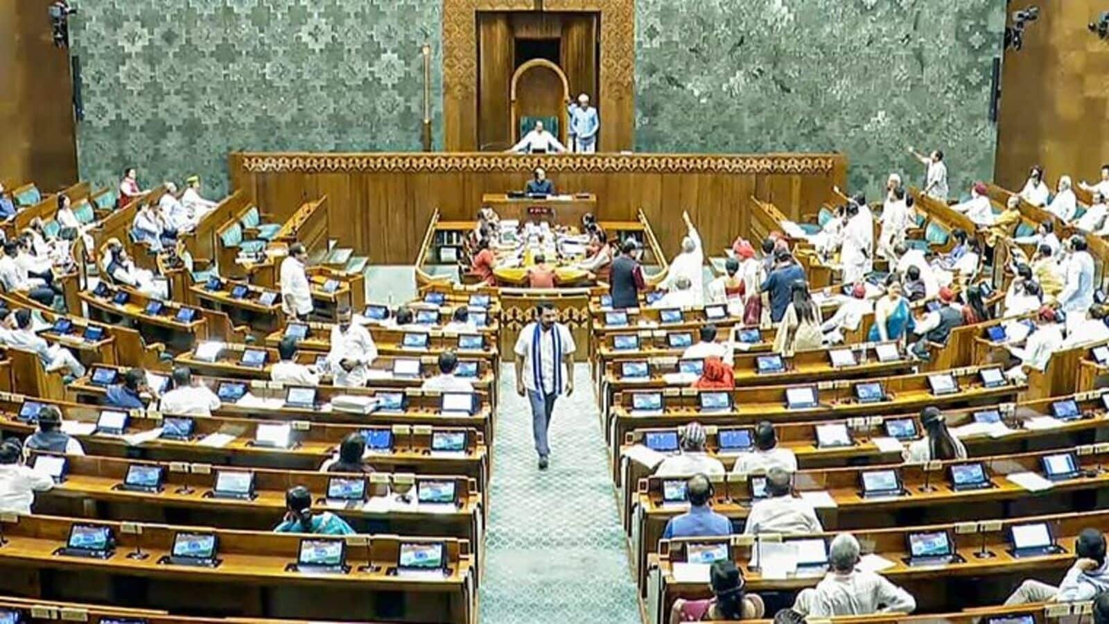 New Delhi, Apr 01 (ANI): Opposition MPs protest in the Lok Sabha during the Budget Session of the Parliament, in New Delhi on Tuesday. (ANI Photo/Sansad TV)