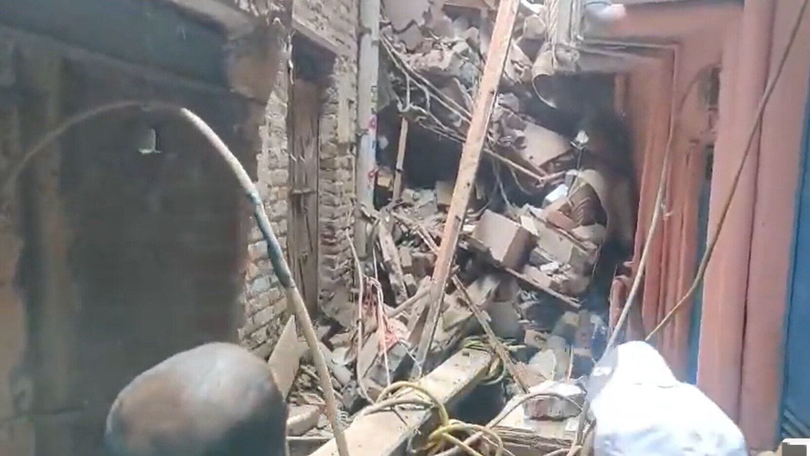 A video grab of the Seelampur building collapse incident. Photo: X