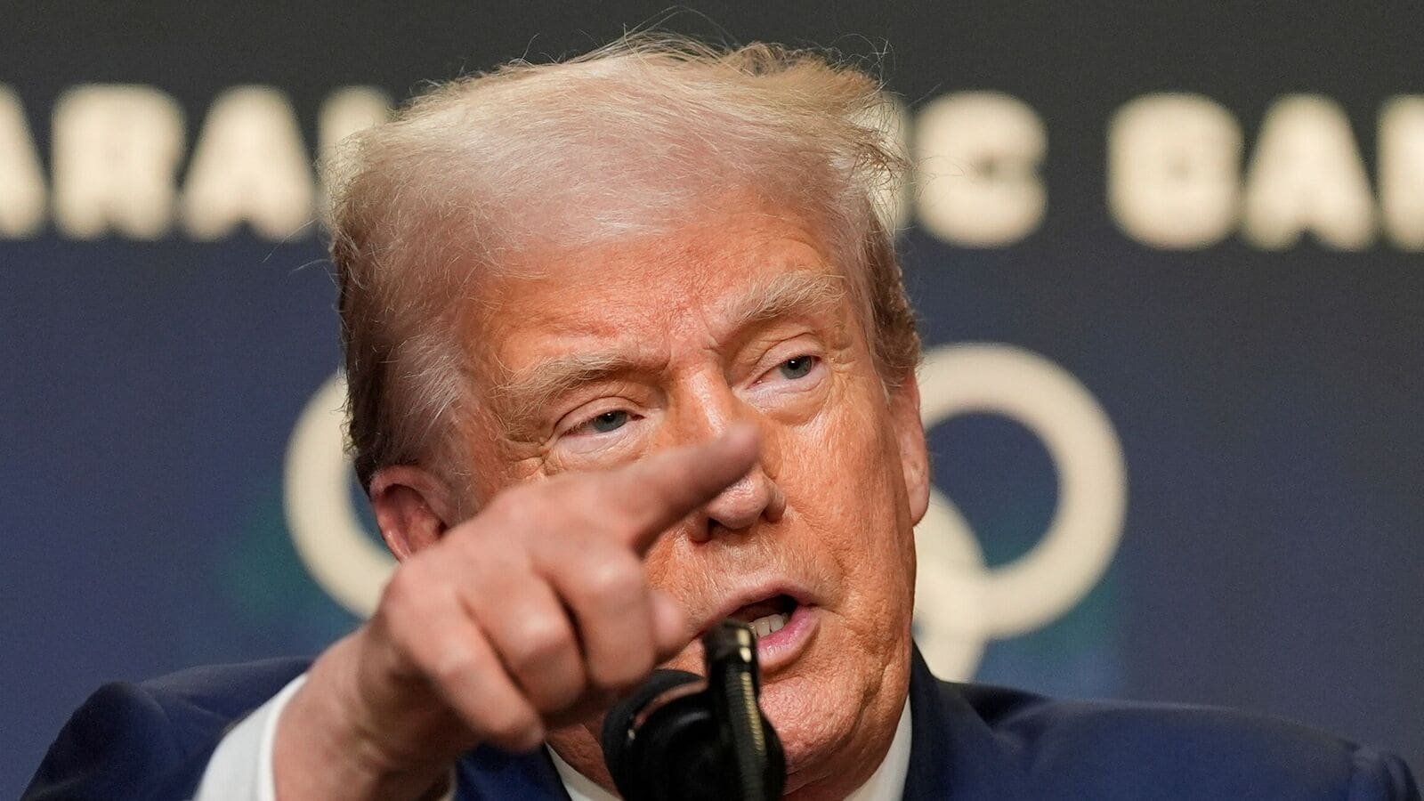 As part of his 'America First' agenda, President Trump will unveil a $100 billion pledge from Apple to expand US manufacturing, according to Bloomberg. (AP Photo/Alex Brandon)