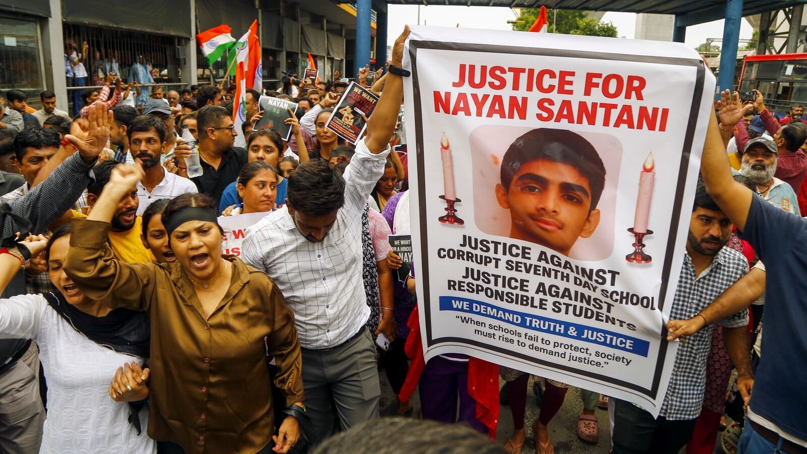 Ahmedabad: People take part in a protest rally demanding justice for a class 10 student of a private school who was allegedly murdered by his junior following a minor scuffle, in Ahmedabad, Thursday, Aug. 21, 2025. (PTI Photo)(PTI08_21_2025_000294B)