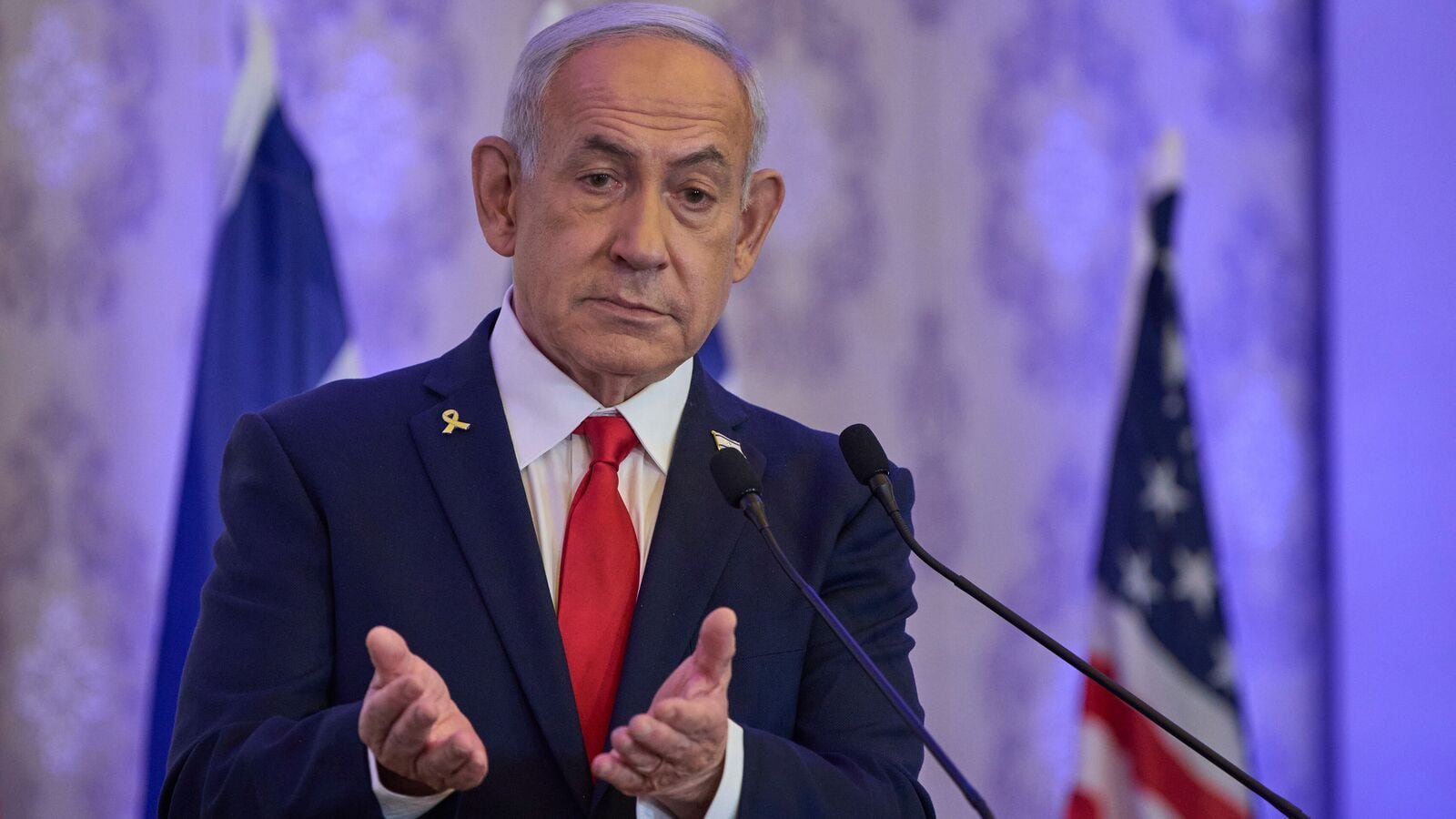 Israeli Prime Minister Benjamin Netanyahu speaks to the audience at a conference in Jerusalem, Sunday, July 27, 2025.