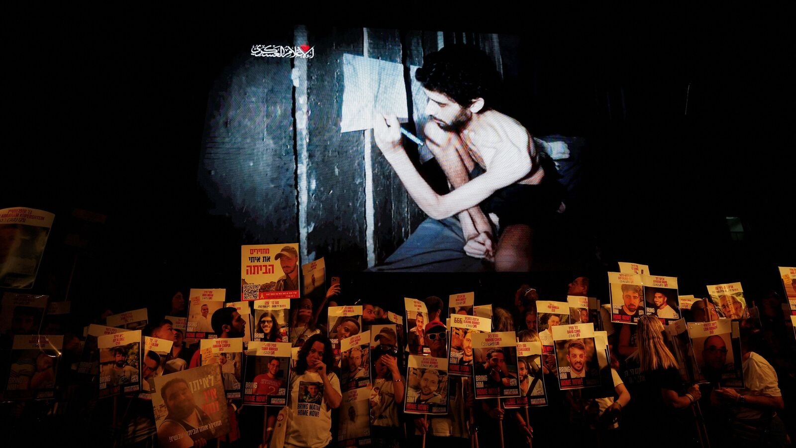 Demonstrators take part in a protest to demand the immediate release of hostages held in Gaza since the October 7, 2023, attack on Israel by Hamas and to end the war, as a video released by Hamas of hostage Evyatar David is displayed, in Tel Aviv, Israel, August 2, 2025.