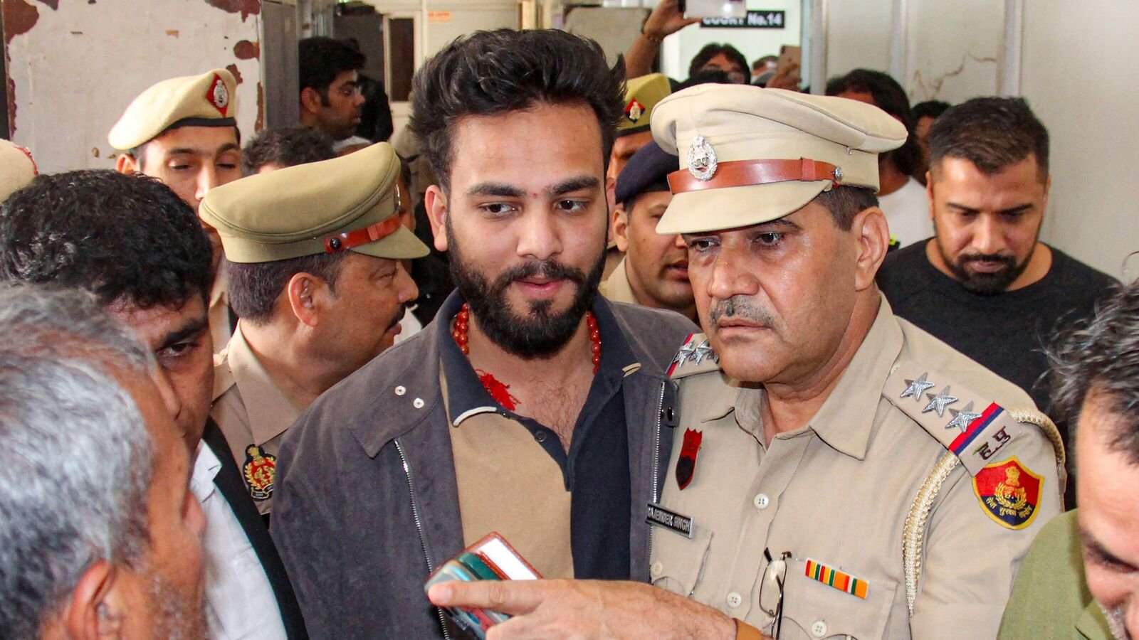 File image of youtuber Elvish Yadav being produced in a court, in Gurugram in March. The ED filed a money laundering case against Yadav and some others under the charge of suspected use of snake venom as a recreational drug in parties he hosted.