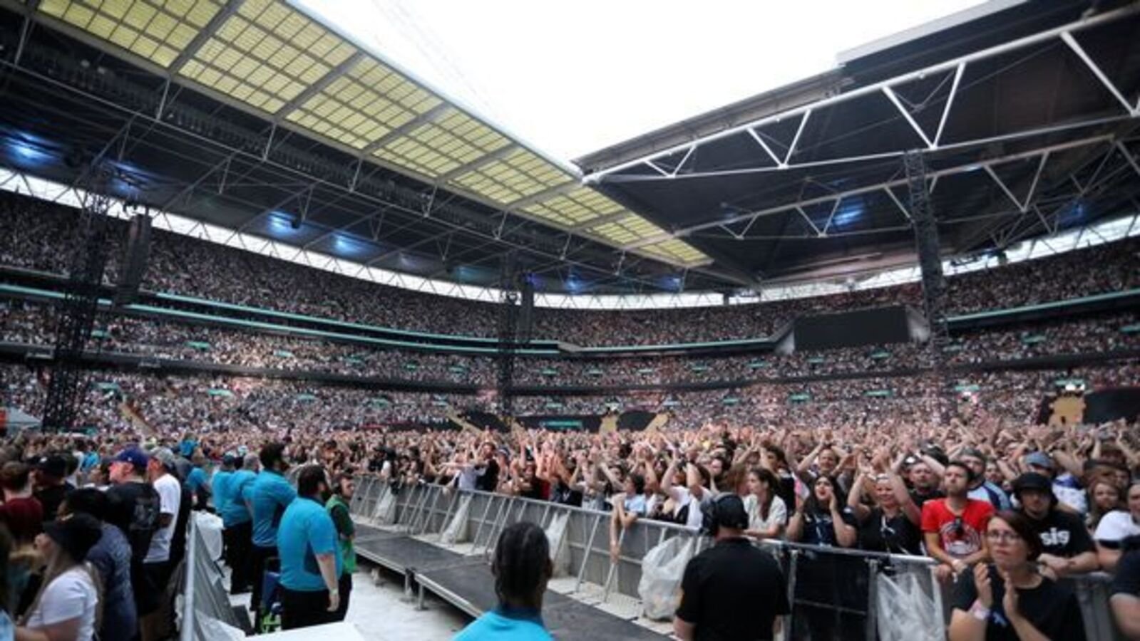A man fell to his death at Oasis' Wembley concert.