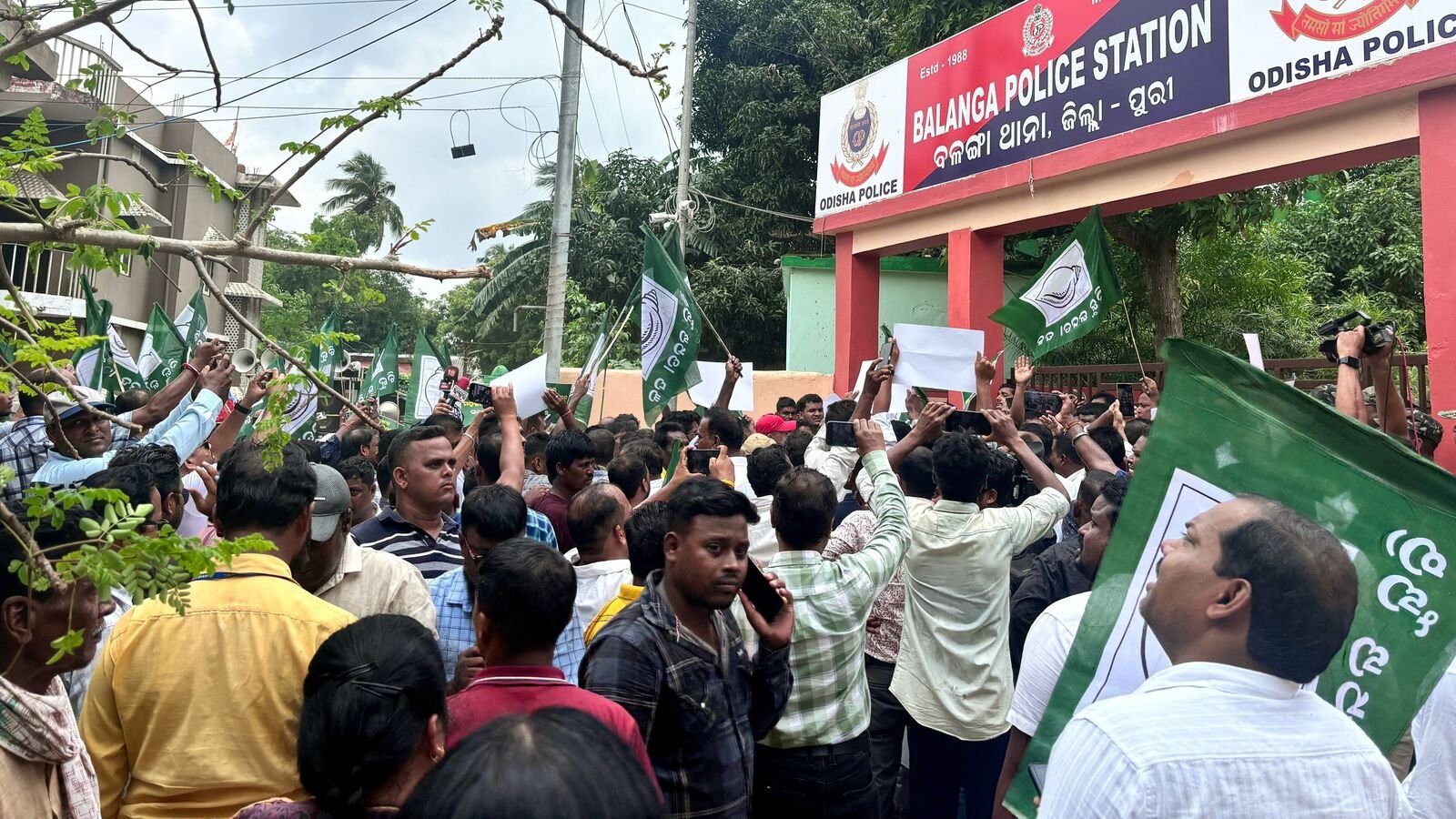 Puri: Biju Janata Dal (BJD) workers during a gherao at a police station in protest after a 15-year-old girl was set on fire by unidentified persons in the district on Saturday, at Balanga, in Puri district, Odisha on July 20, 2025. (PTI Photo)