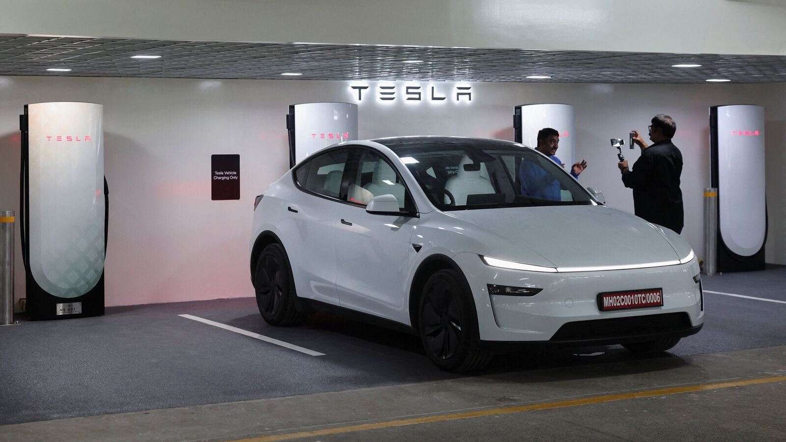 A view shows a TESLA Model Y at a charging station in Mumbai