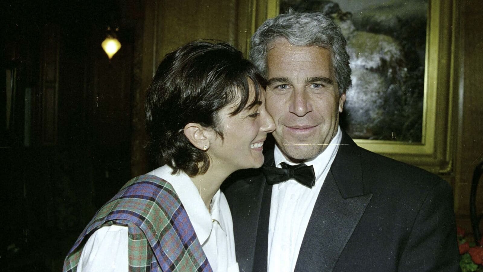 This undated trial evidence image obtained December 8, 2021, from the US District Court for the Southern District of New York shows British socialite Ghislaine Maxwell and US financier Jeffrey Epstein. (Photo by Handout / US District Court for the Southern District of New York / AFP)