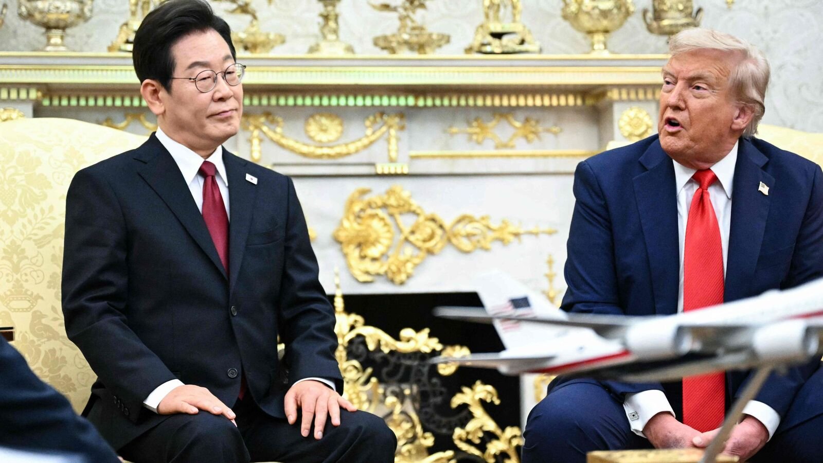 US President Donald Trump speaks during a bilateral meeting with South Korean President Lee Jae Myung in the Oval Office of the White House in Washington, DC, on August 25, 2025. (Photo by Mandel NGAN / AFP)