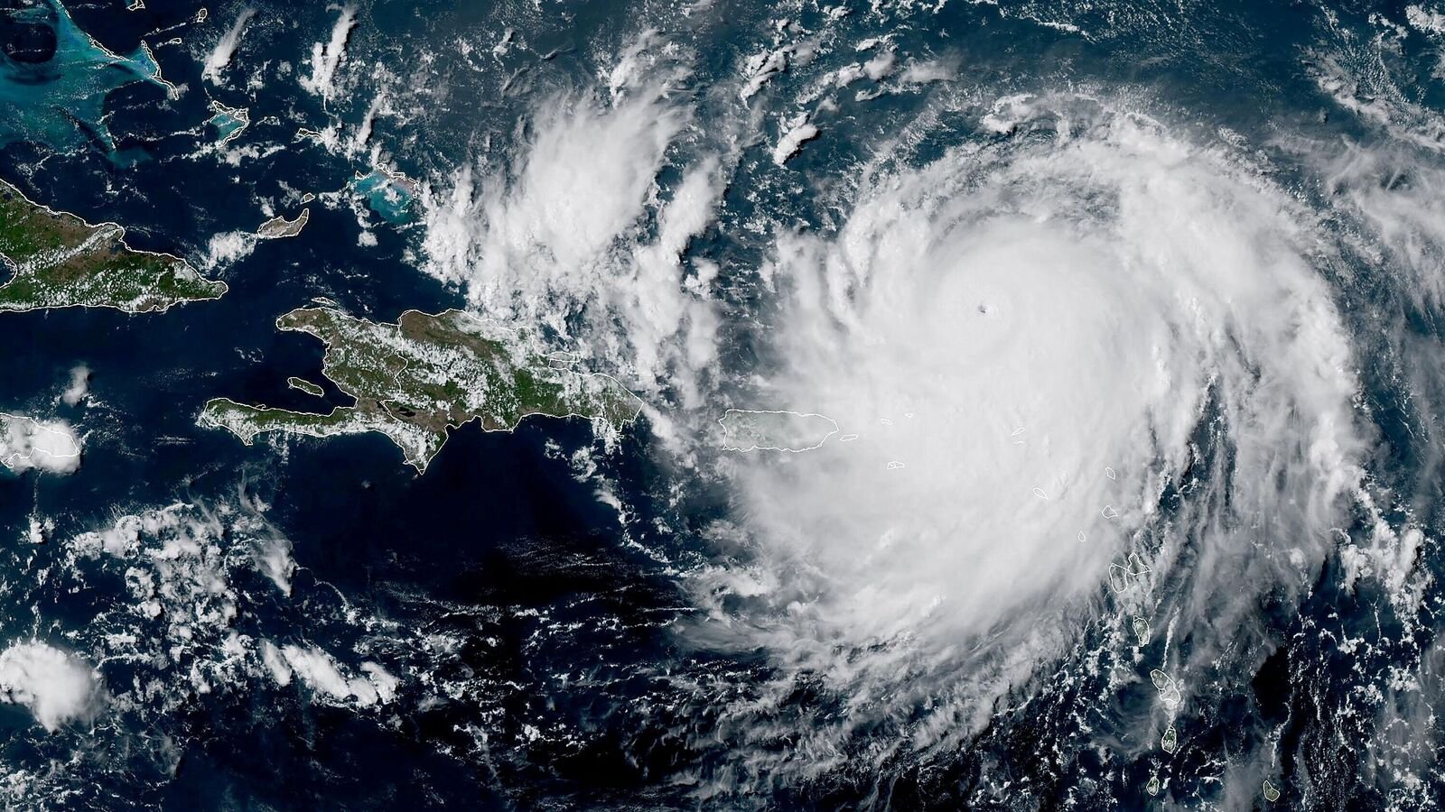 Hurricane Erin, which is the first hurricane of the 2025 Atlantic season and has developed into a dangerous Category 4 hurricane, moves westward near Puerto Rico in a composite satellite image August 16, 2025.