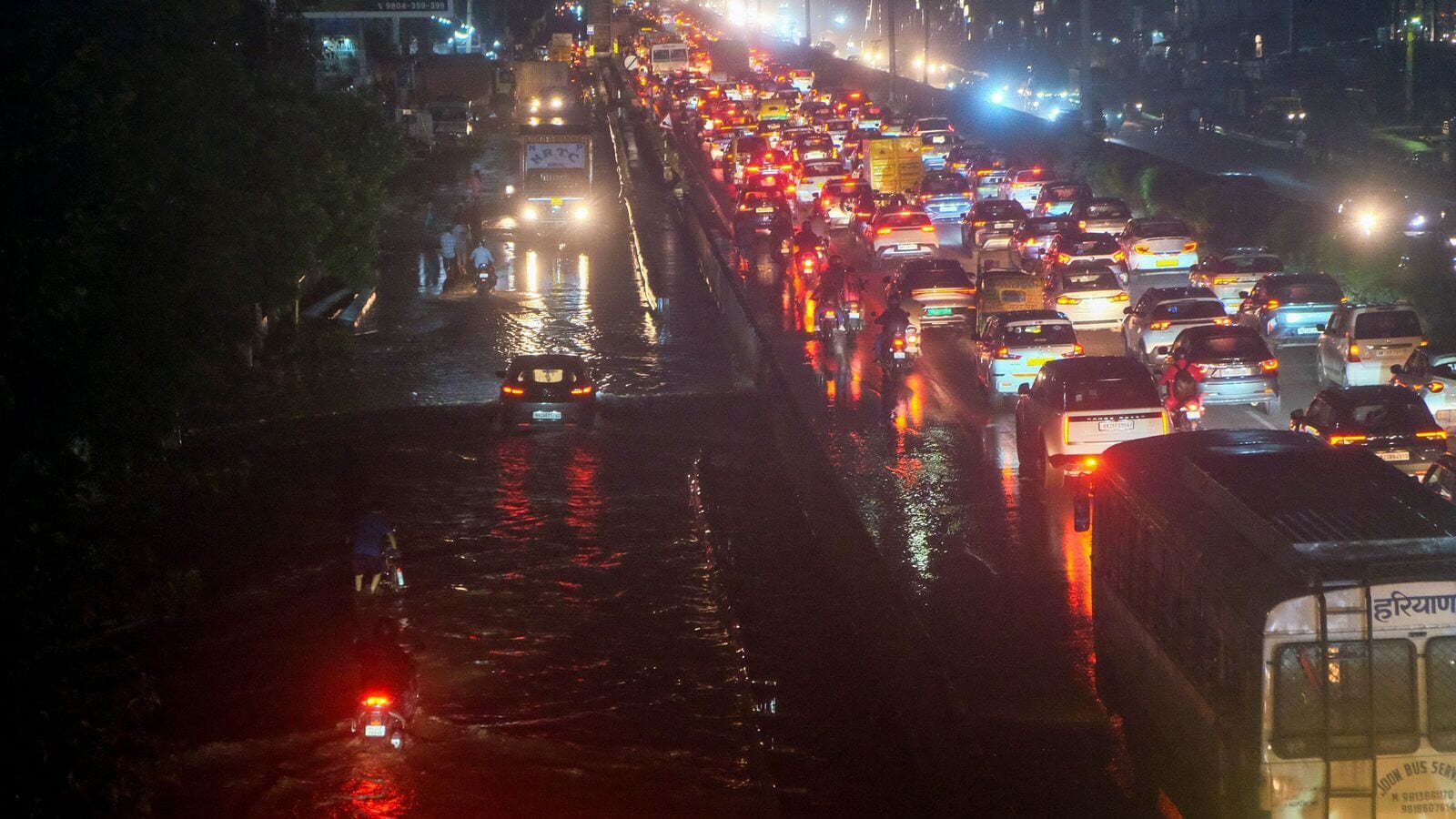 Gurugram: Vehicles stuck in a traffic jam along the Delhi-Gurugram expressway after rainfall, Monday, Aug. 4, 2025. (PTI Photo) (PTI08_04_2025_000539B)