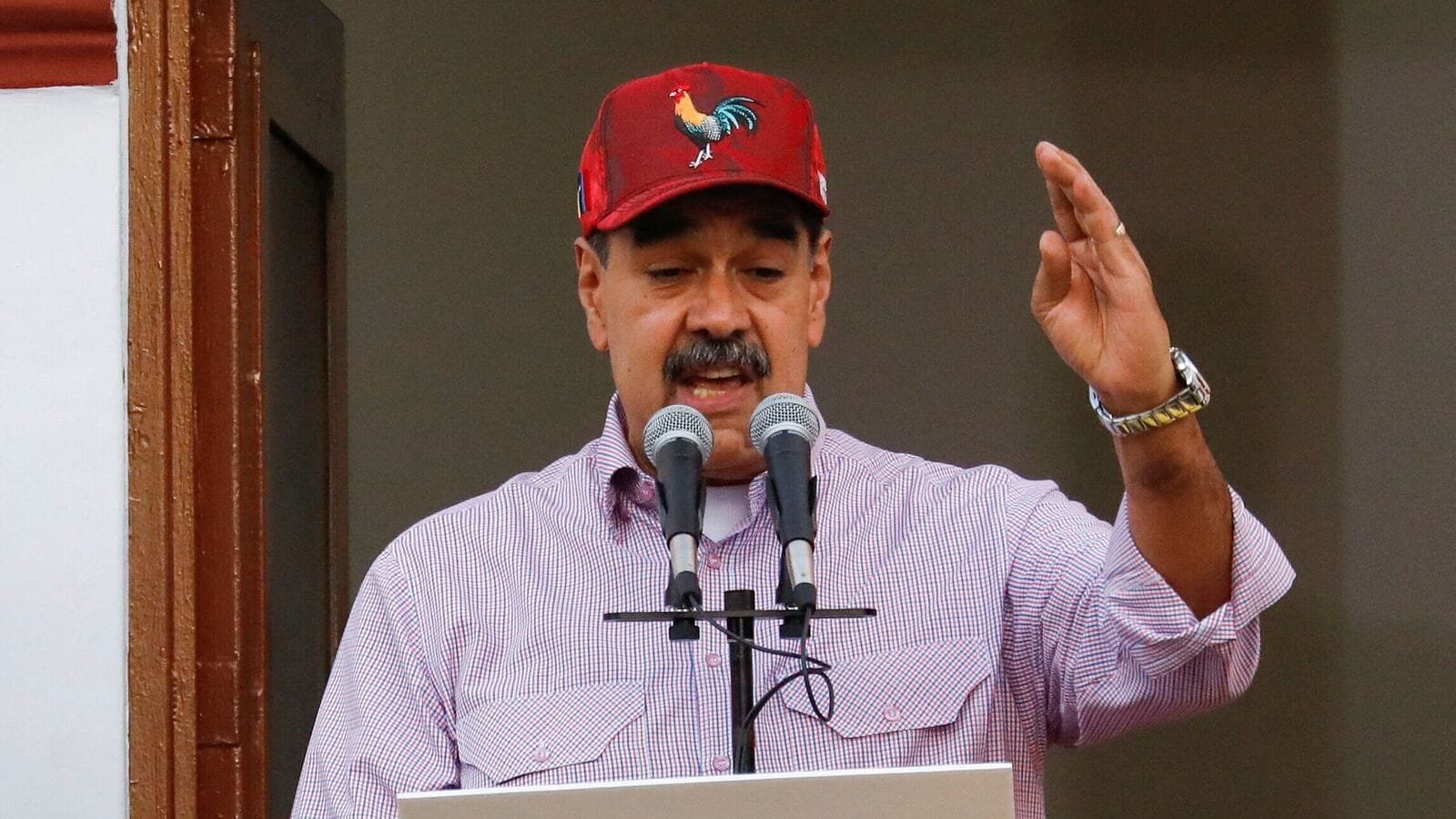 Venezuelan President Nicolas Maduro addresses supporters during a march marking the first anniversary of his victory in the disputed July 28 presidential election, in Caracas, Venezuela July 28, 2025. REUTERS/Leonardo Fernandez Viloria
