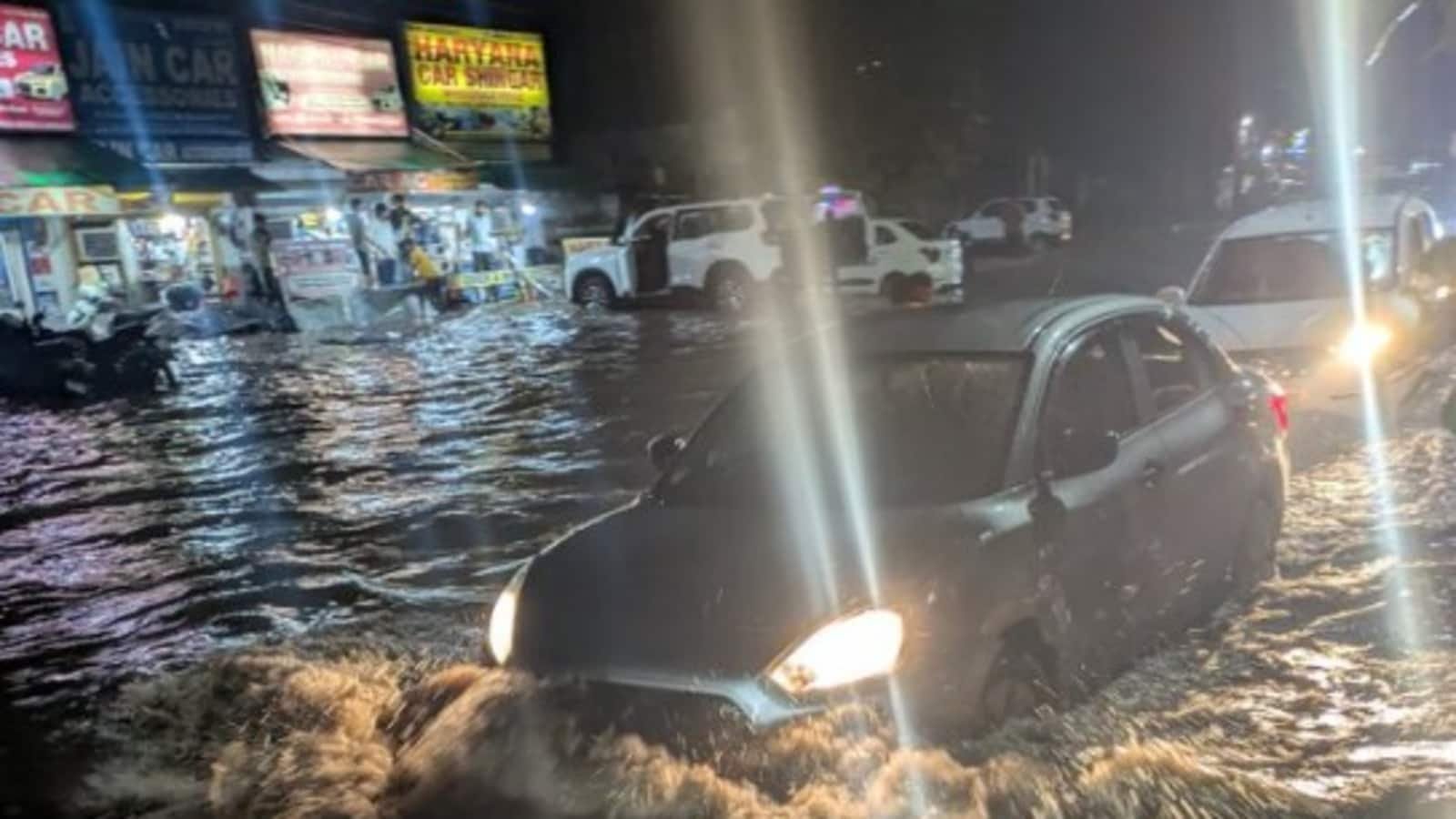 Gurugram roads flooded after heavy rains, power outage reported; massive traffic on Delhi-Jaipur Highway