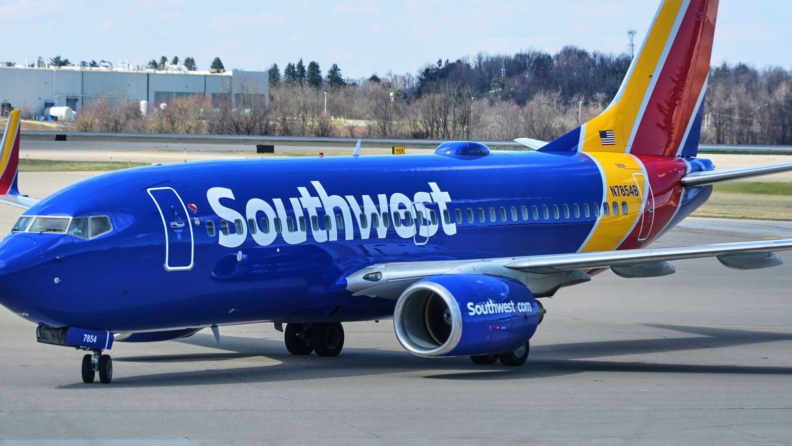 Starting January 27, Southwest Airlines will require passengers who cannot fit between standard seat armrests to buy an additional seat in advance. (AP Photo/Gene J. Puskar, File)