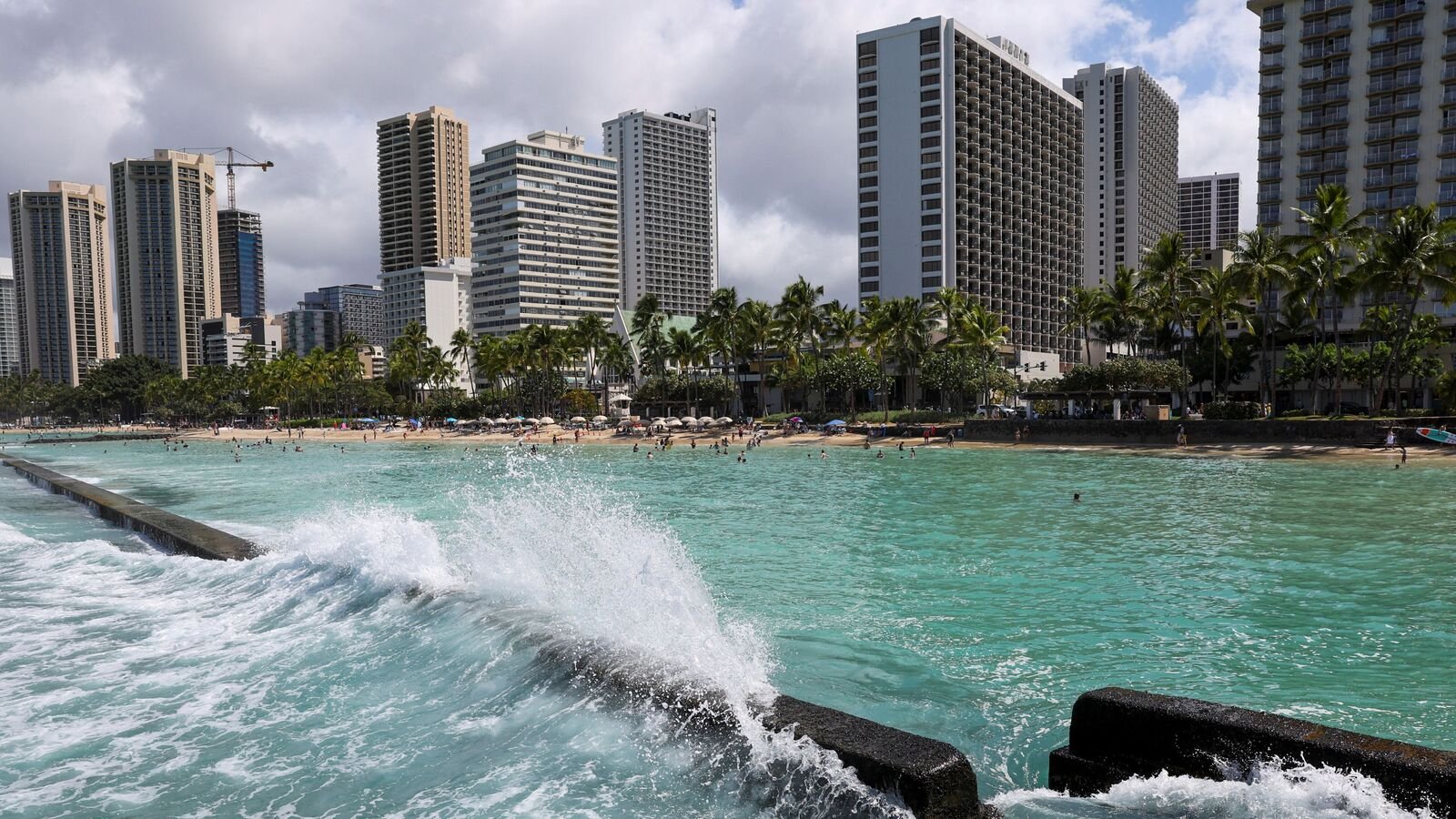 Waves slam into a sea wall off Waikiki Beach after authorities downgraded earlier tsunami warnings following an earthquake off Russia’s Far Eastern Kamchatka Peninsula, in Honolulu, Hawaii, US, July 30, 2025. REUTERS/Marco Garcia