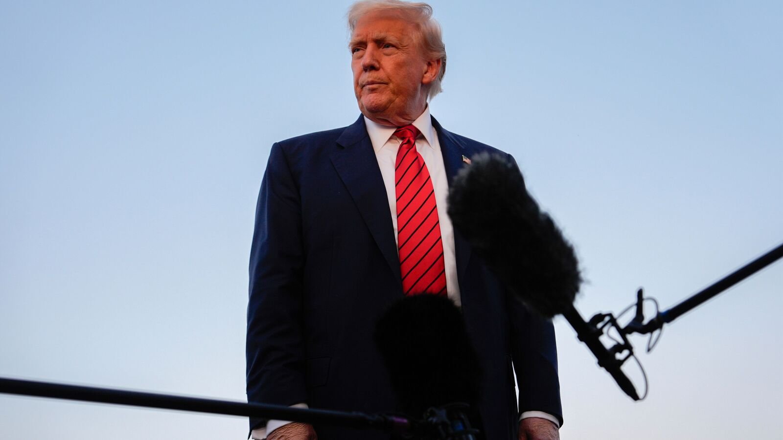 President Donald Trump speaks with reporters before boarding Air Force One at Lehigh Valley International Airport, Sunday, Aug. 3, 2025, in Allentown, Pa.