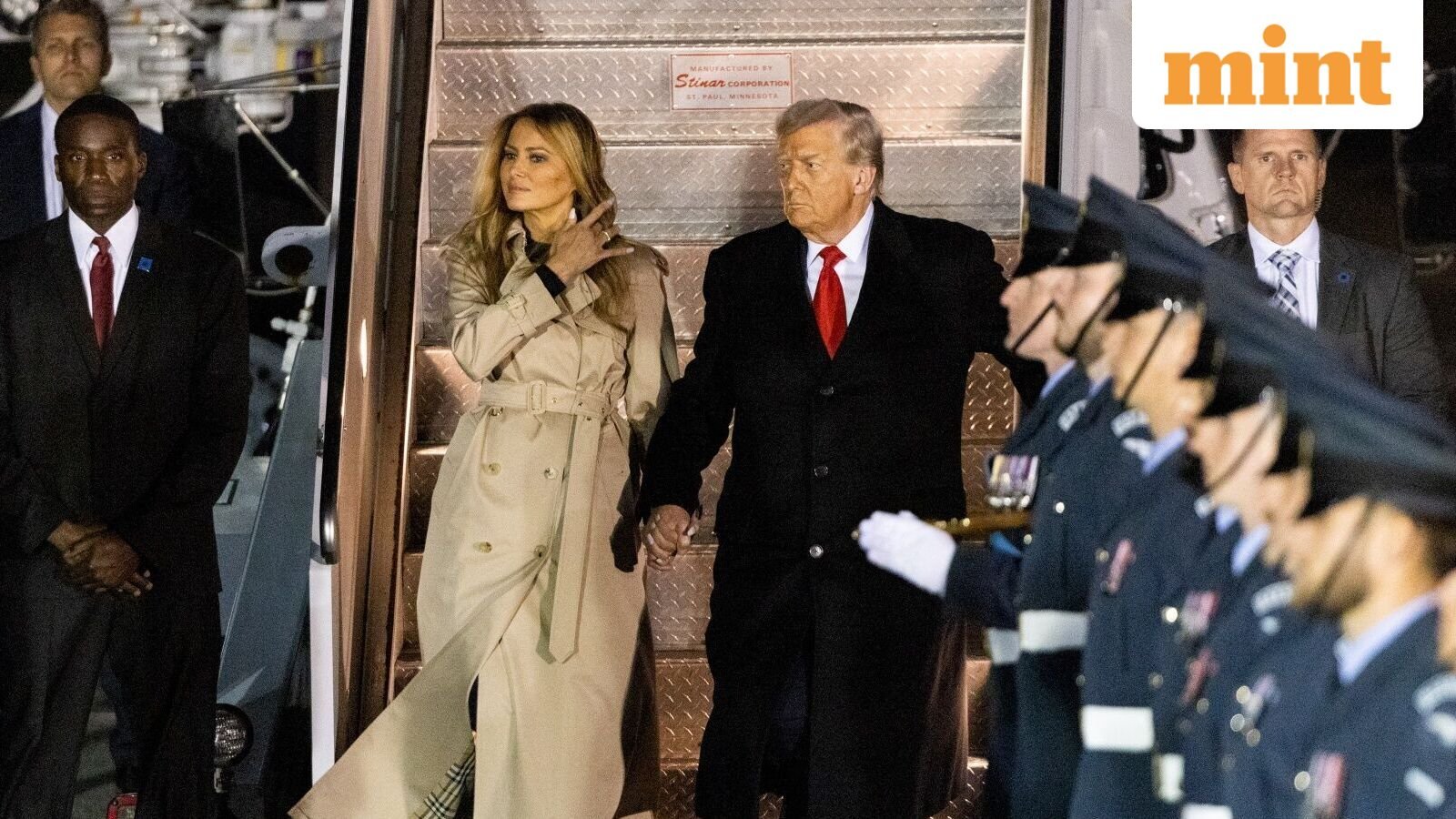 US President Donald Trump, center right, and First Lady Melania Trump, center left, as they disembark from Air Force One after arriving at London Stansted Airport in Stansted, UK, on Tuesday, Sept. 16, 2025.