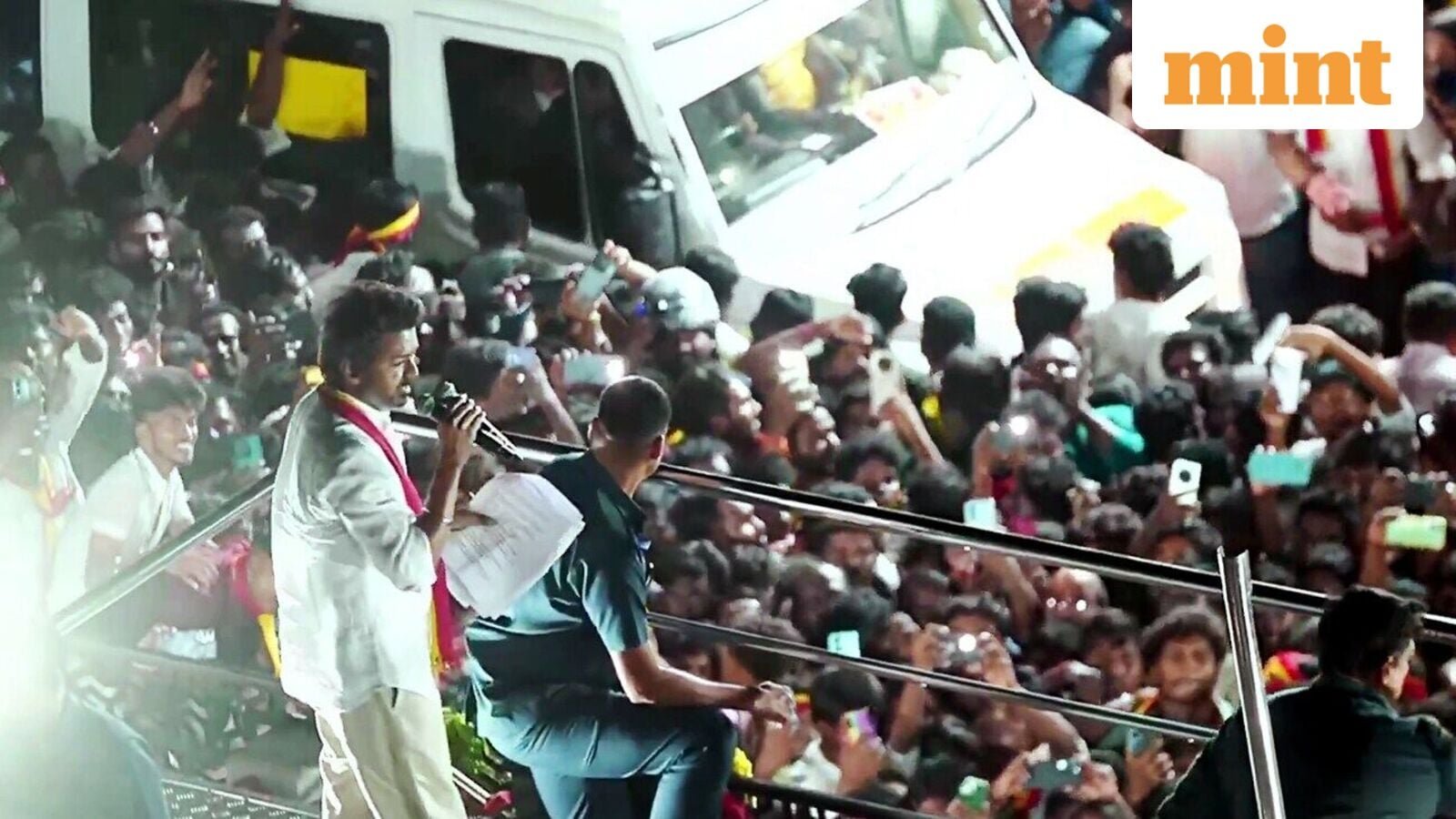 TVK (Tamilaga Vettri Kazhagam) chief and actor Vijay addresses a gathering before a stampede during a public event, in Karur on Saturday